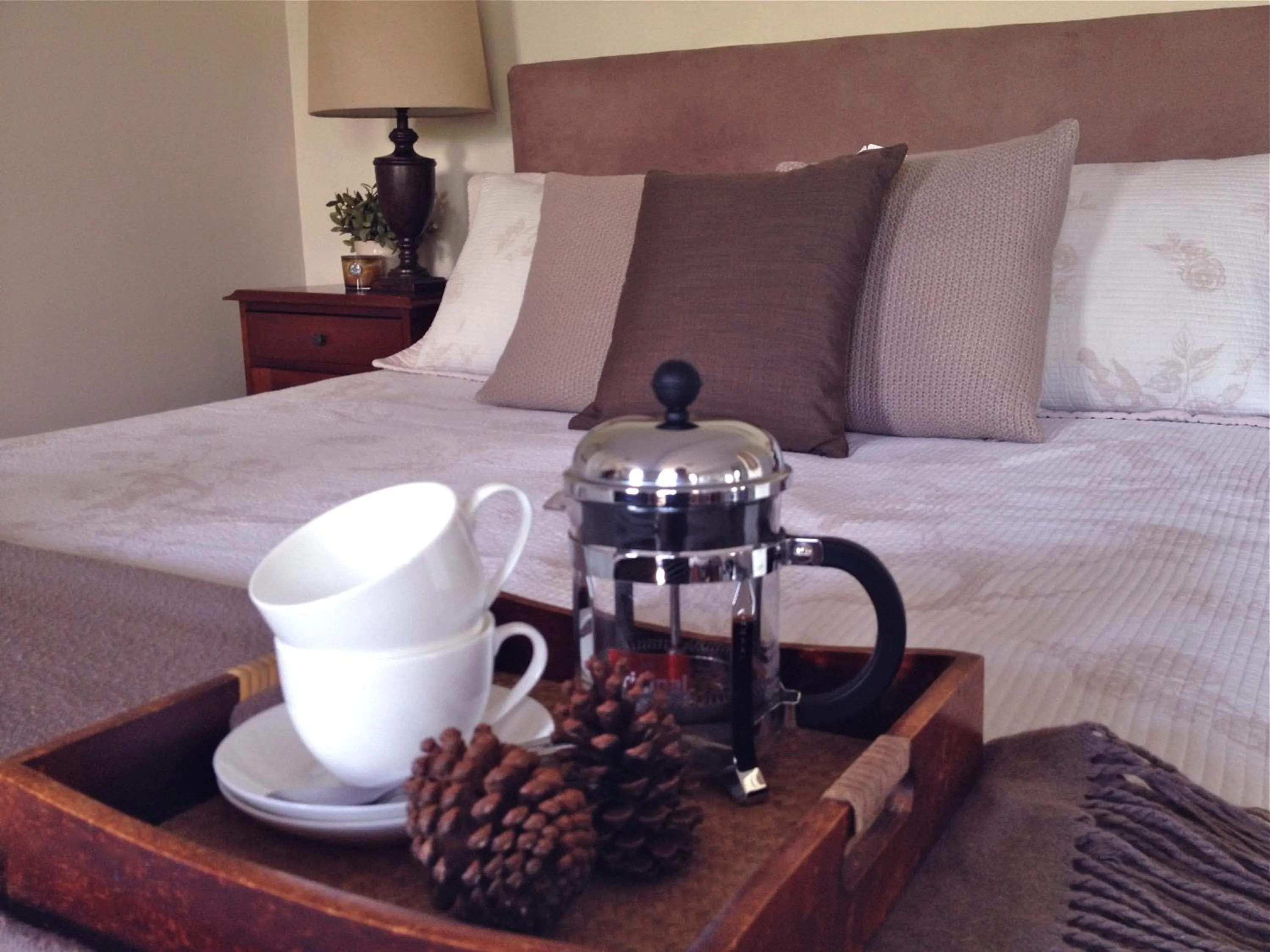 Bed in Jacaranda House Garden Suite