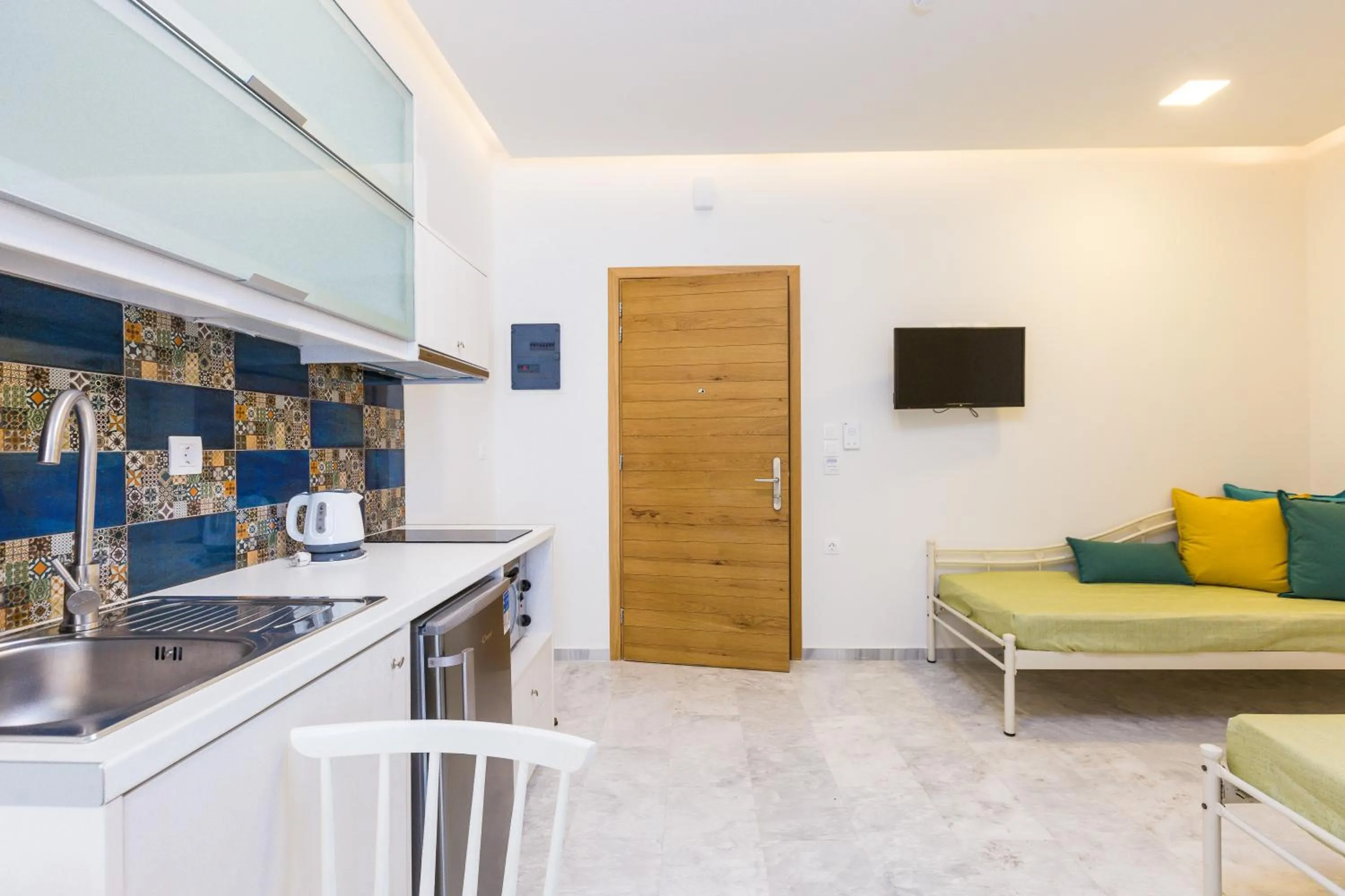 Kitchen or kitchenette in Meltemi Coast Suites