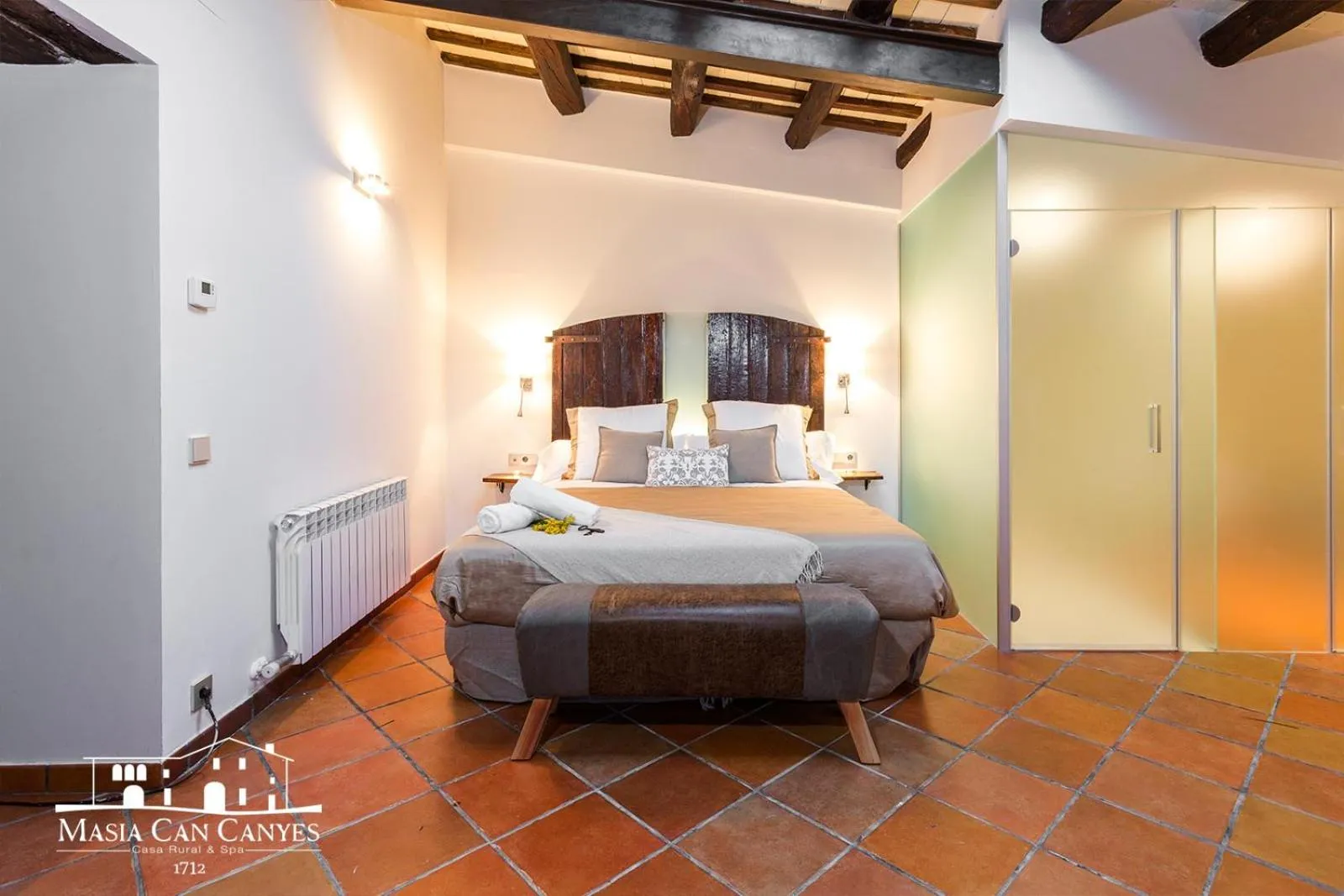 Bed in Masia Can Canyes & Spa