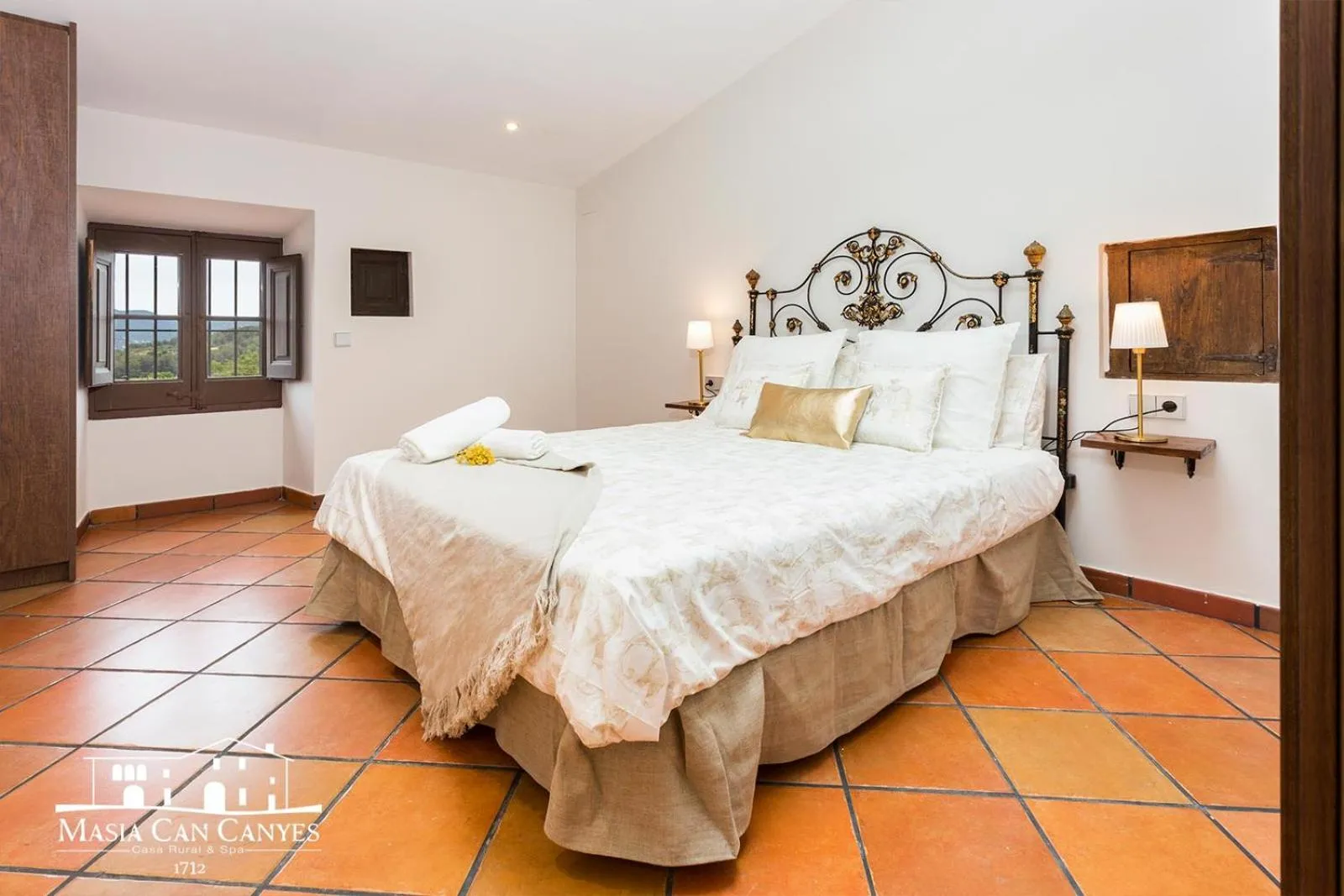 Bed in Masia Can Canyes & Spa