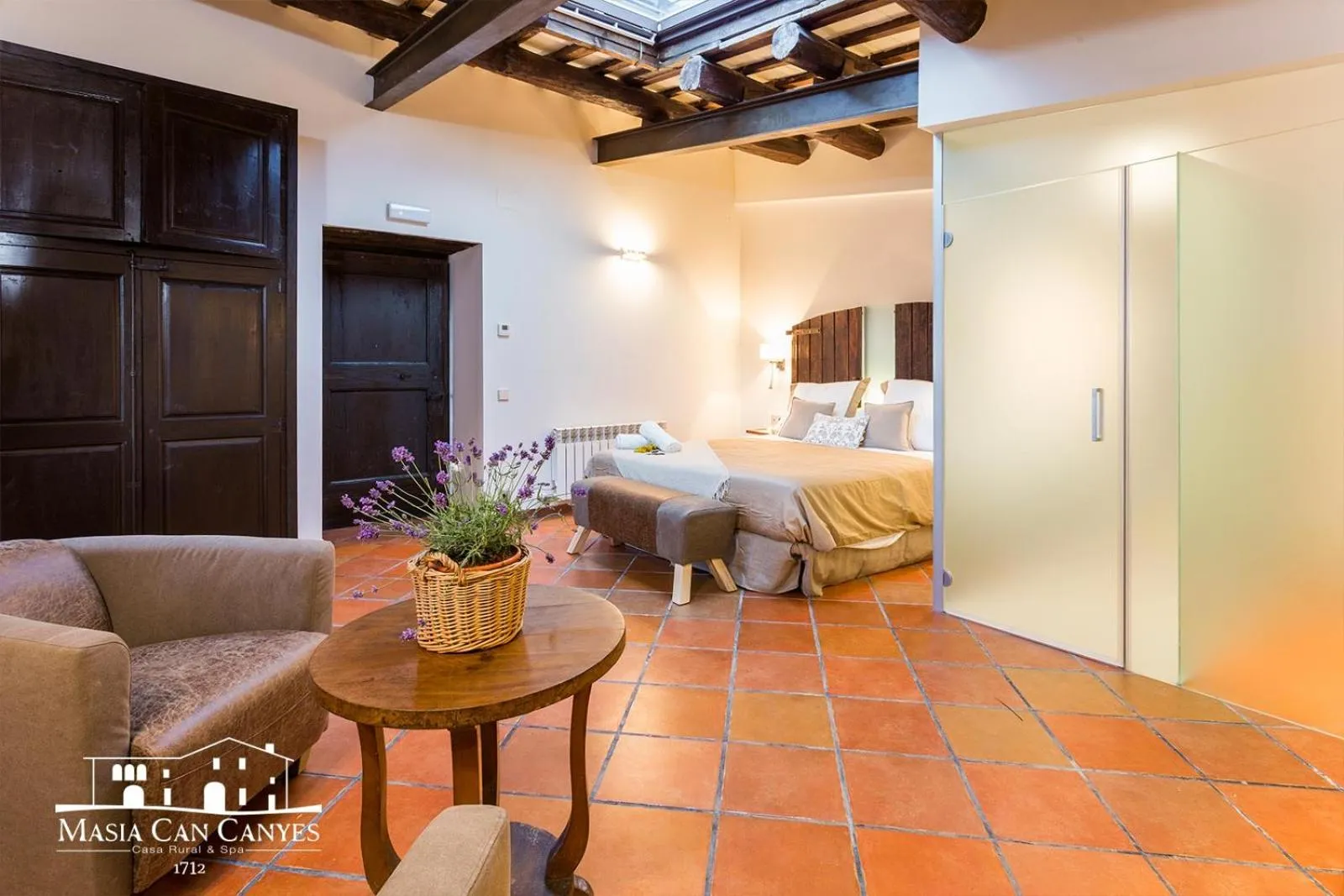 Bed in Masia Can Canyes & Spa