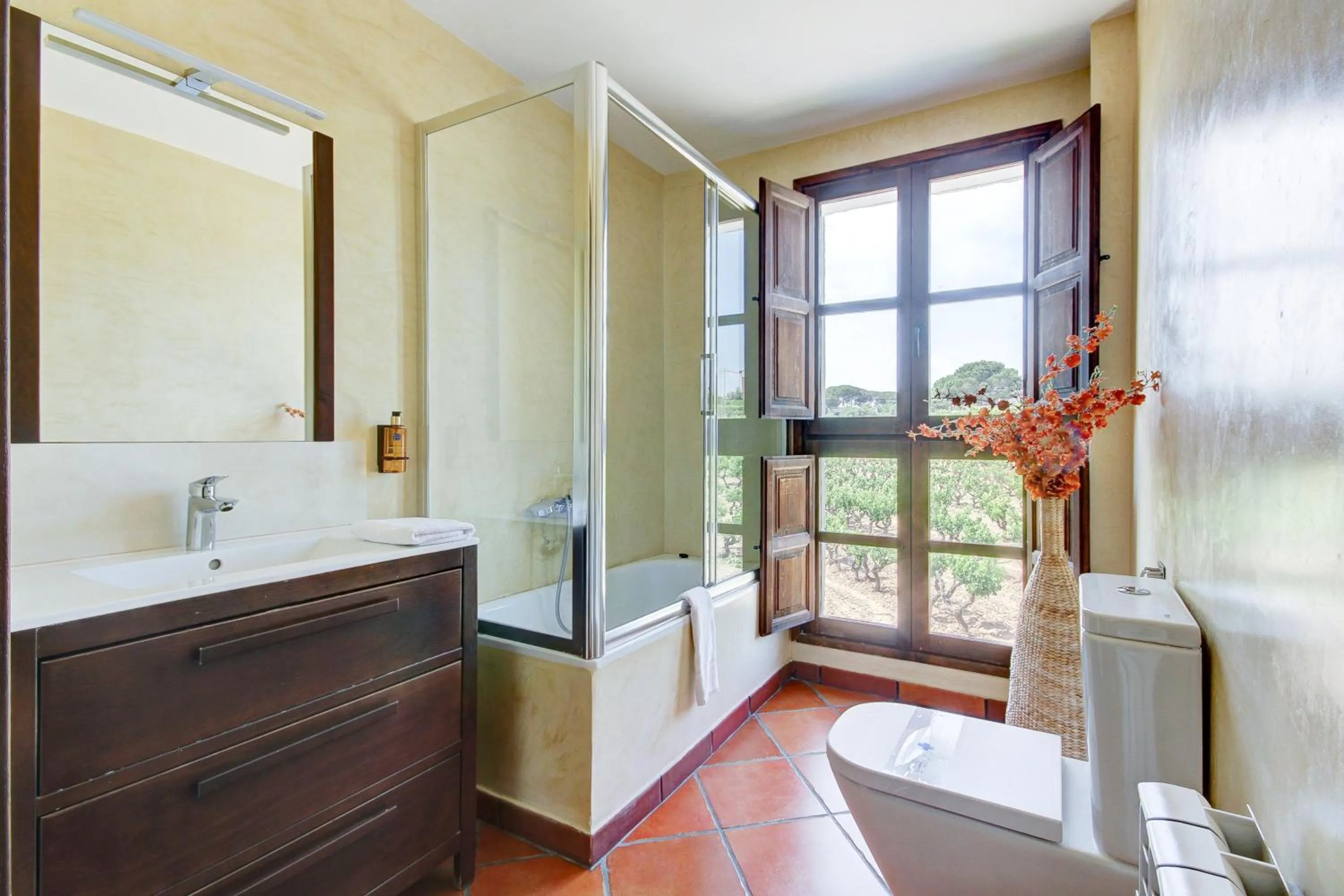Bathroom in Masia Can Canyes & Spa