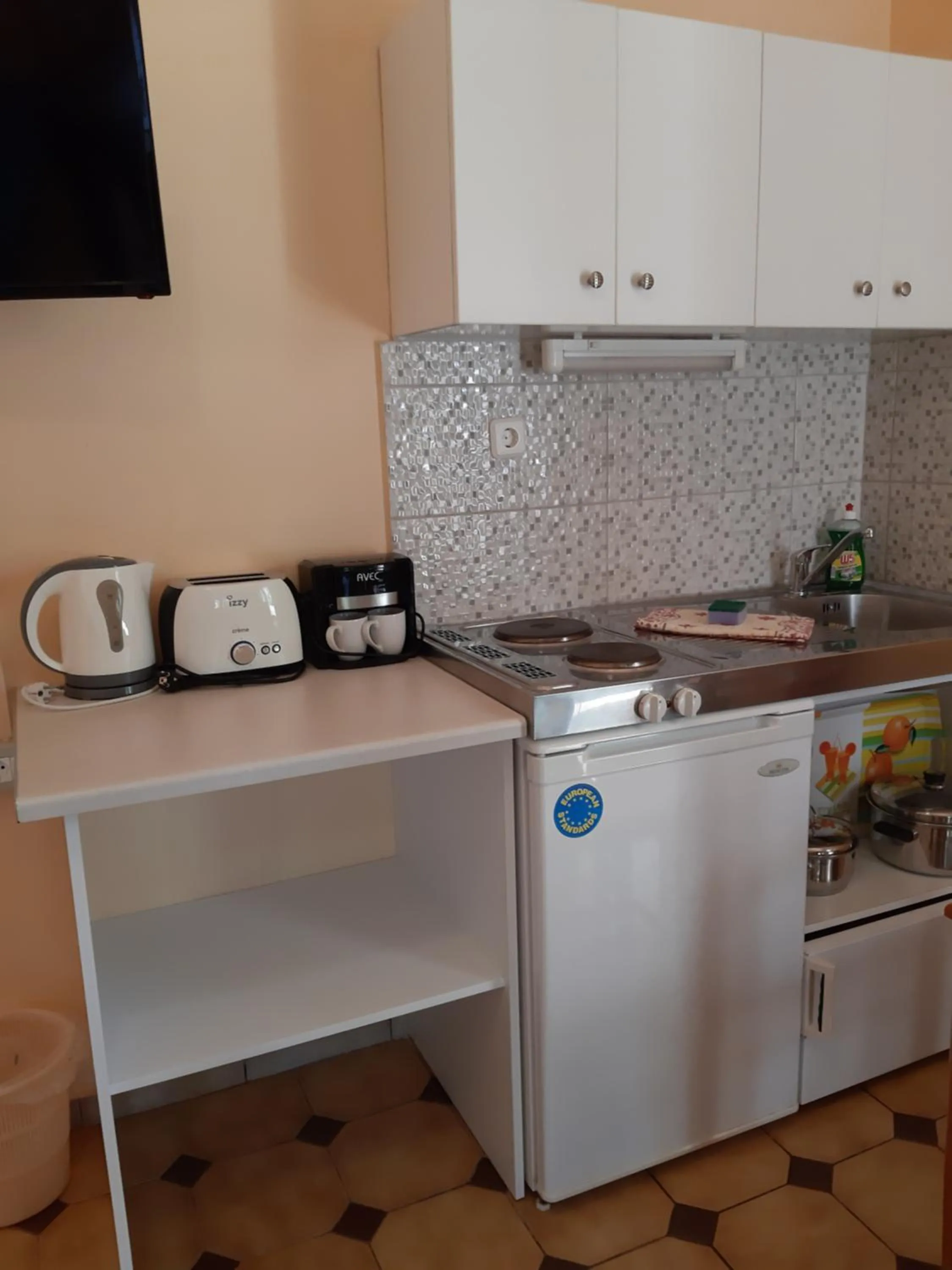 Kitchen or kitchenette in Eden Beach Hotel