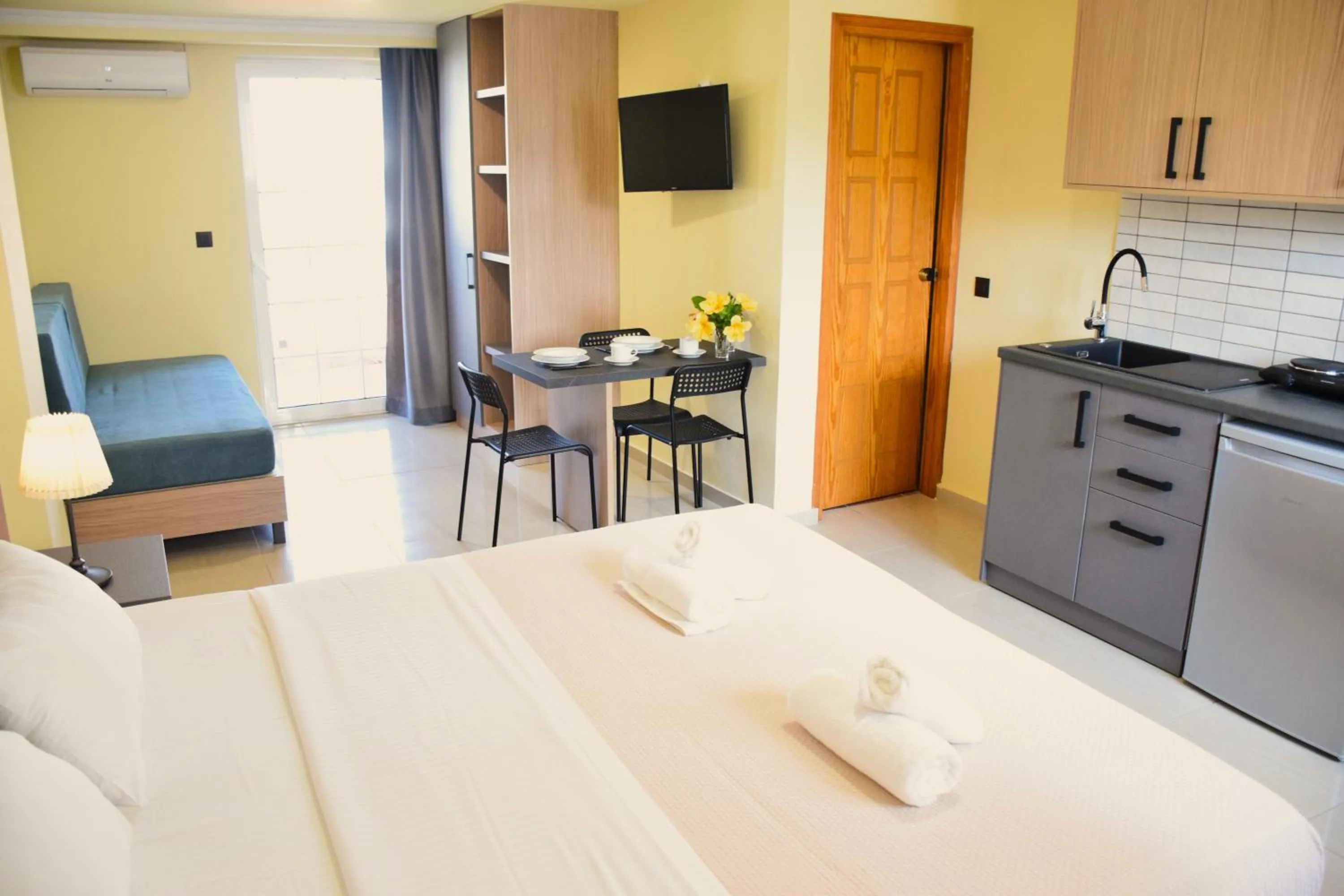 Bed in Eden Beach Hotel