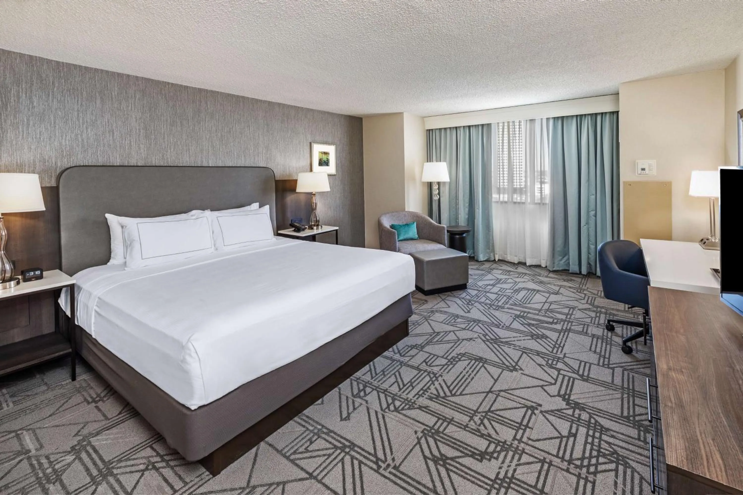 Bed in DoubleTree by Hilton Tulsa Downtown