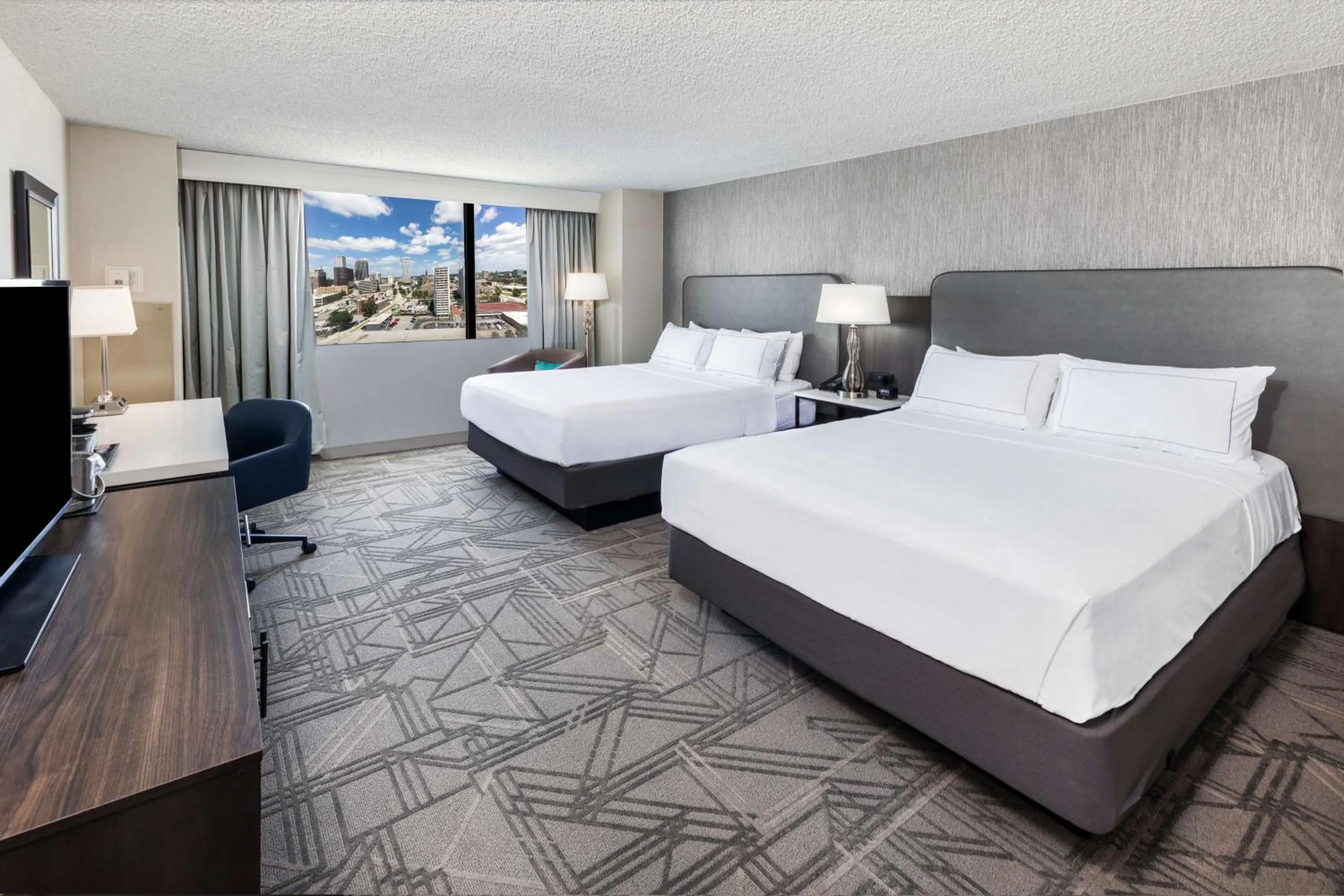 Bed in DoubleTree by Hilton Tulsa Downtown