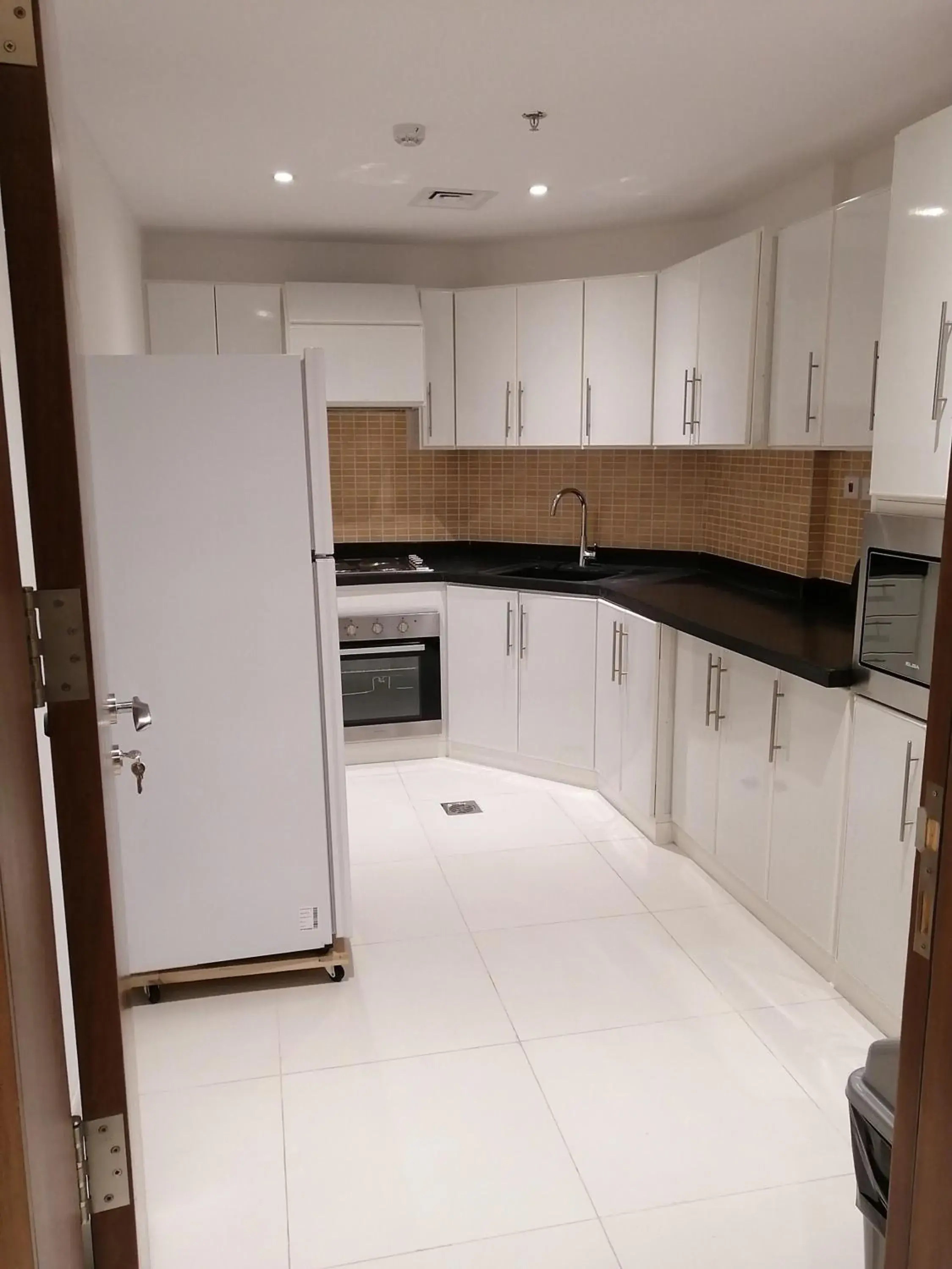 Kitchen or kitchenette in Manazel Al Diafah Serviced Apartments Olaya Kitchen or kitchenette in Manazel Al Diafah Serviced Apartments Olaya