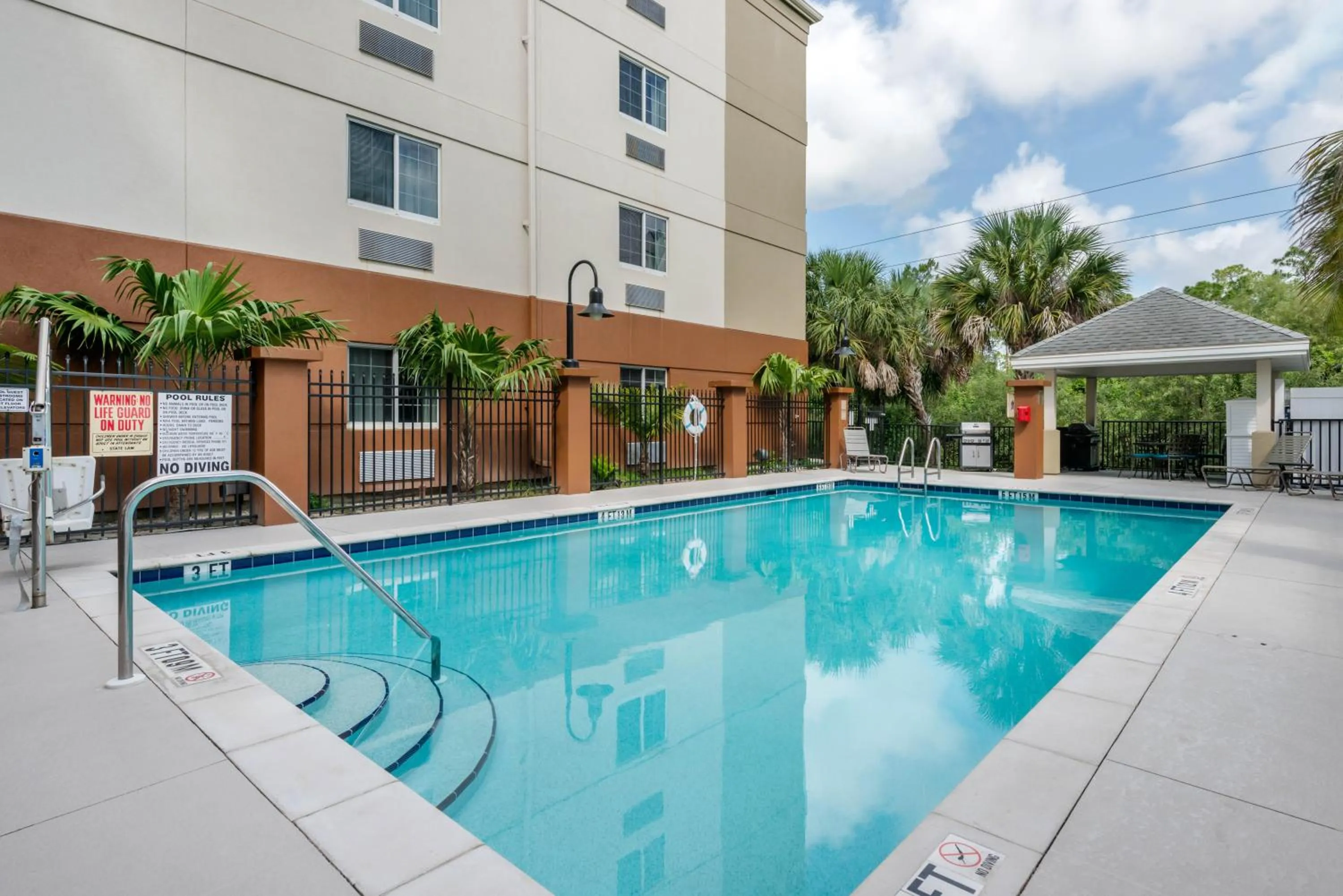 Swimming pool in Candlewood Suites Fort Myers/Sanibel Gateway by IHG