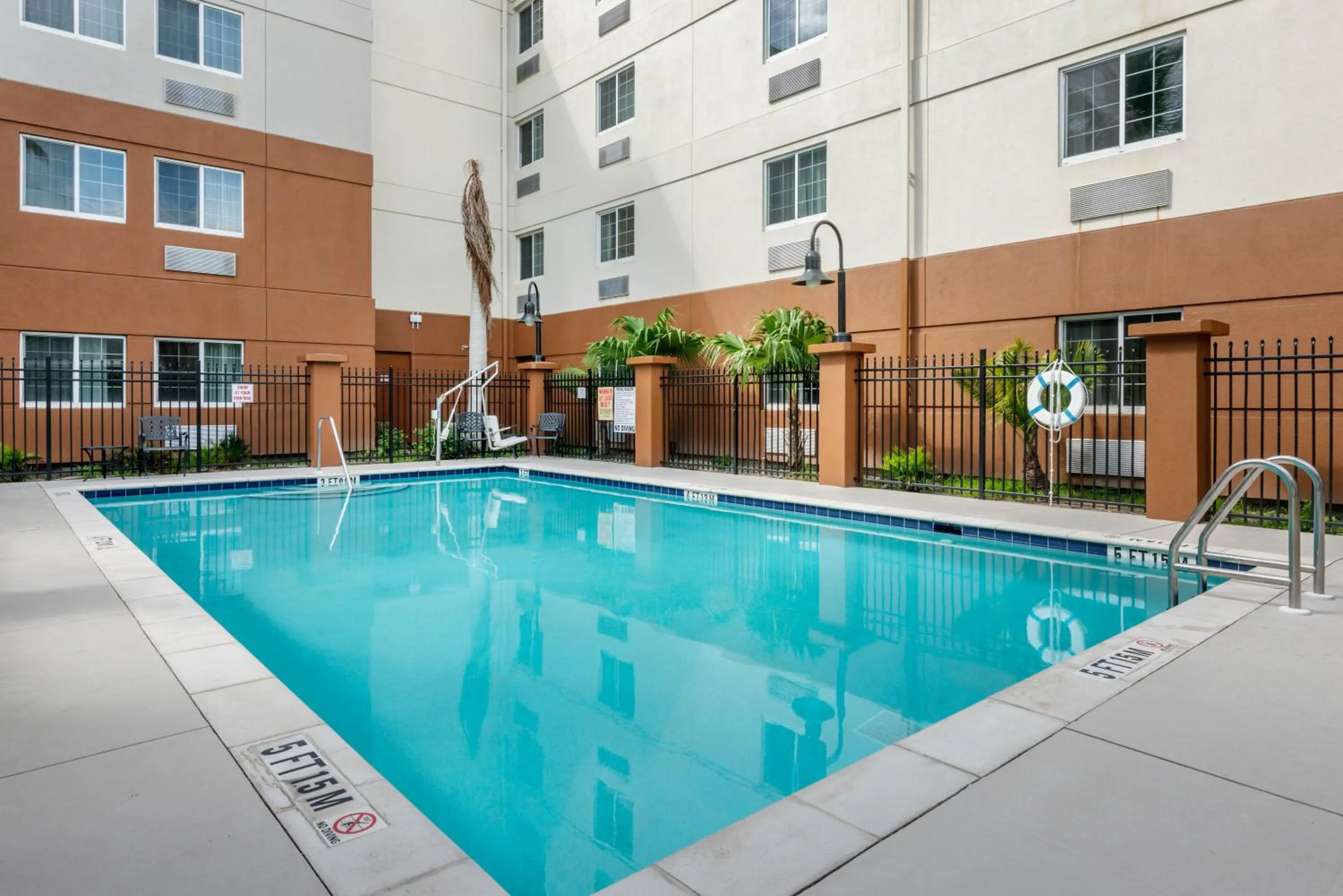Swimming pool in Candlewood Suites Fort Myers/Sanibel Gateway by IHG