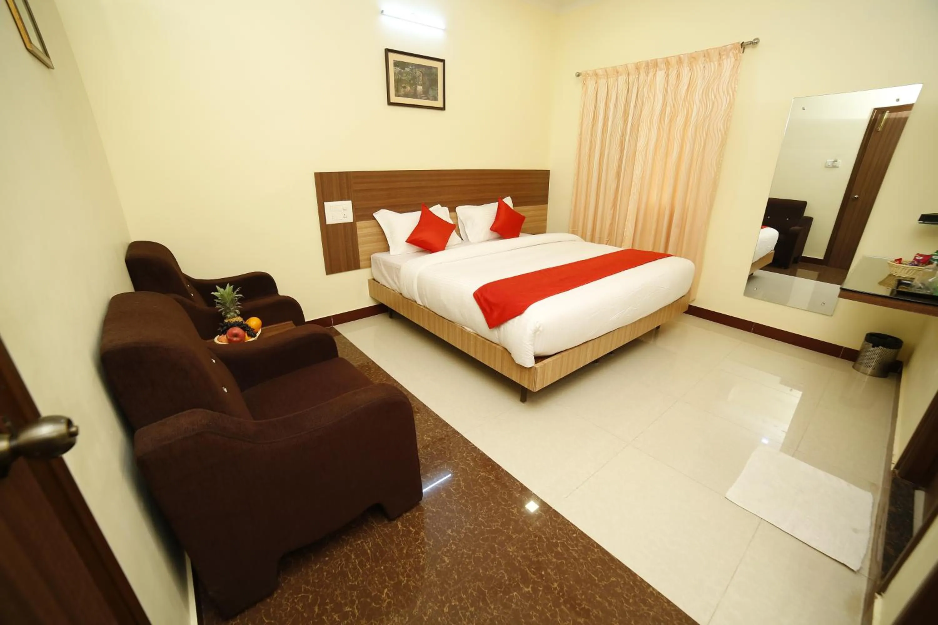 Photo of the whole room, Bed in Hotel Sree Devi Madurai