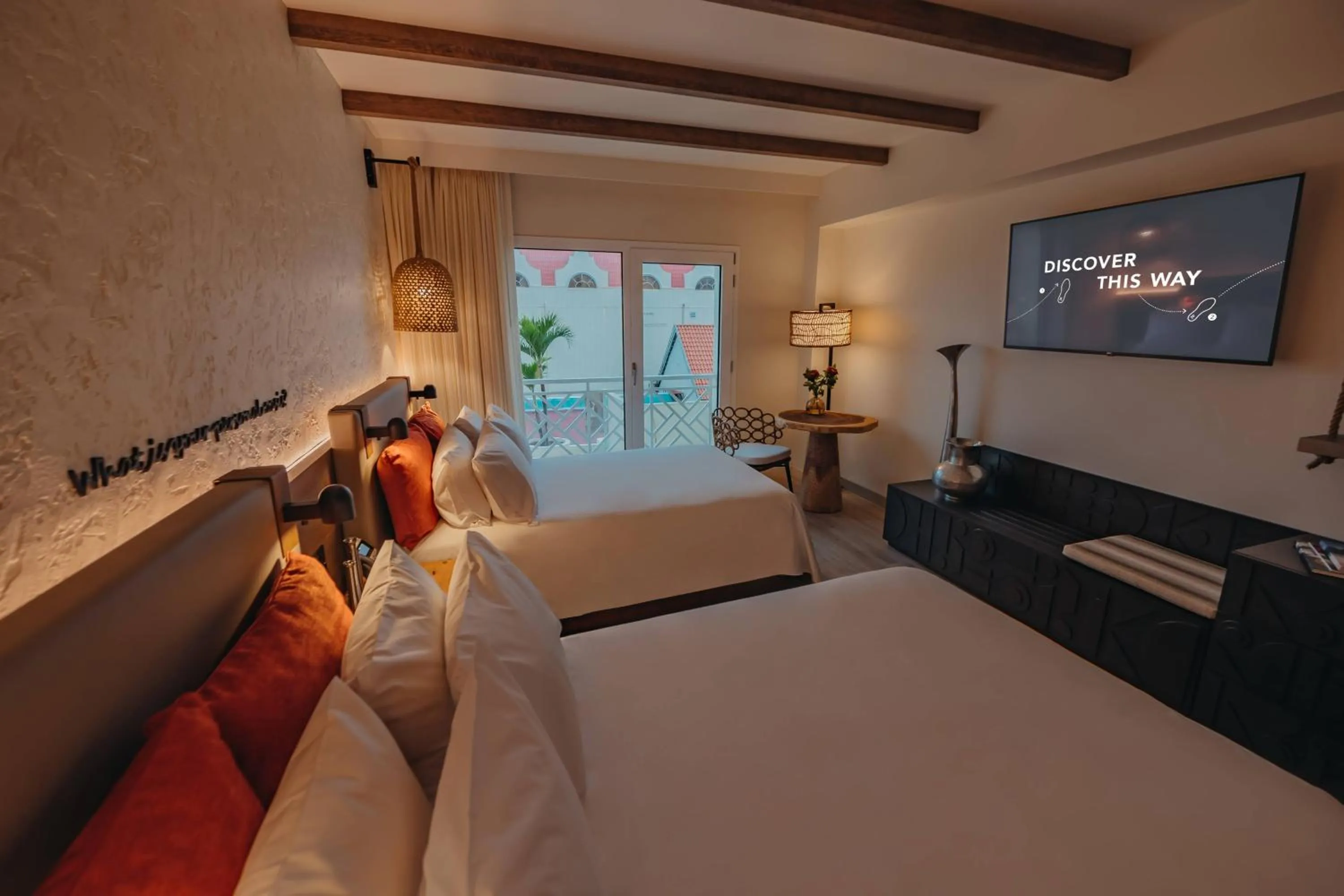 Photo of the whole room, Bed in Renaissance Wind Creek Aruba Resort