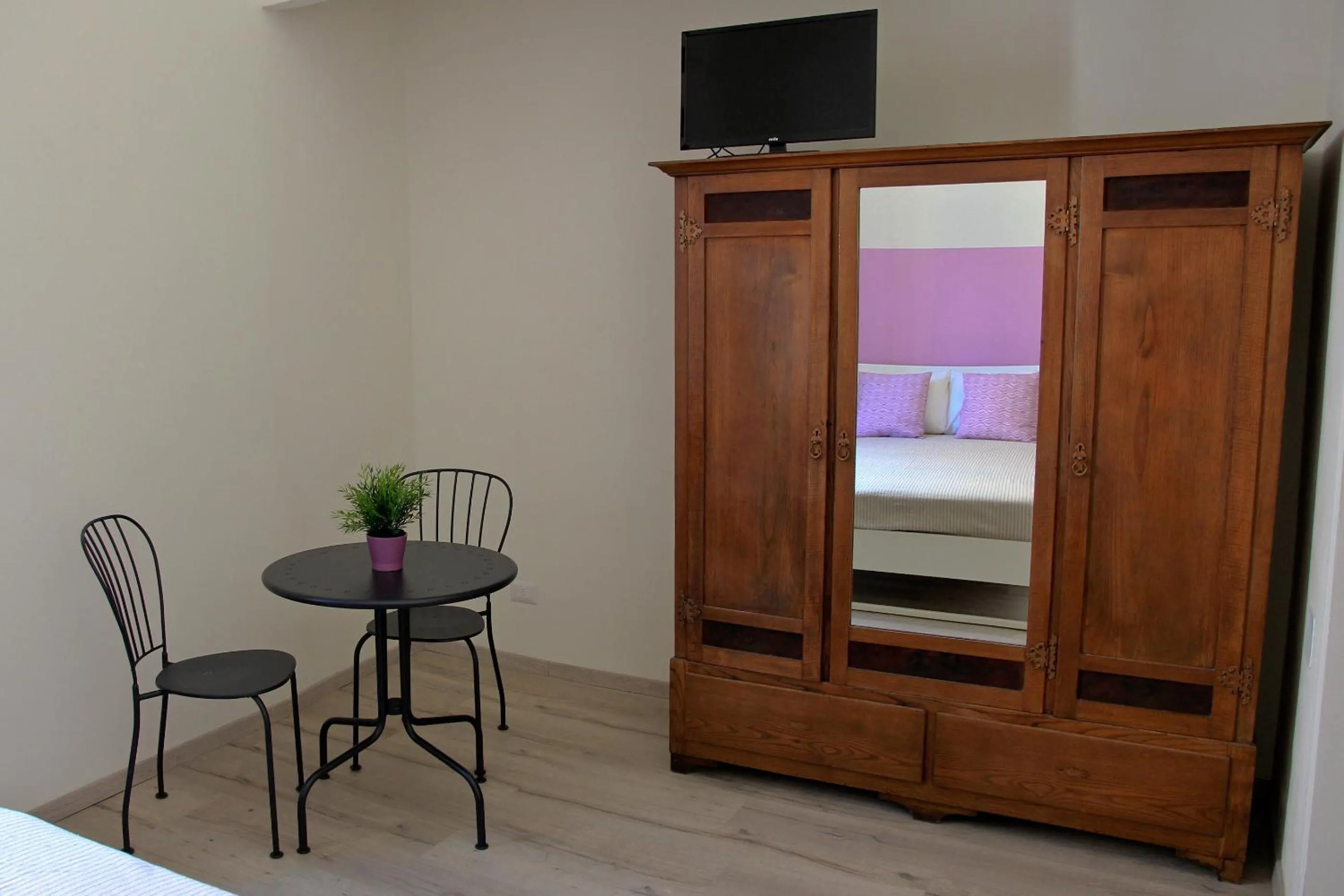 Bed in Hotel Elandra