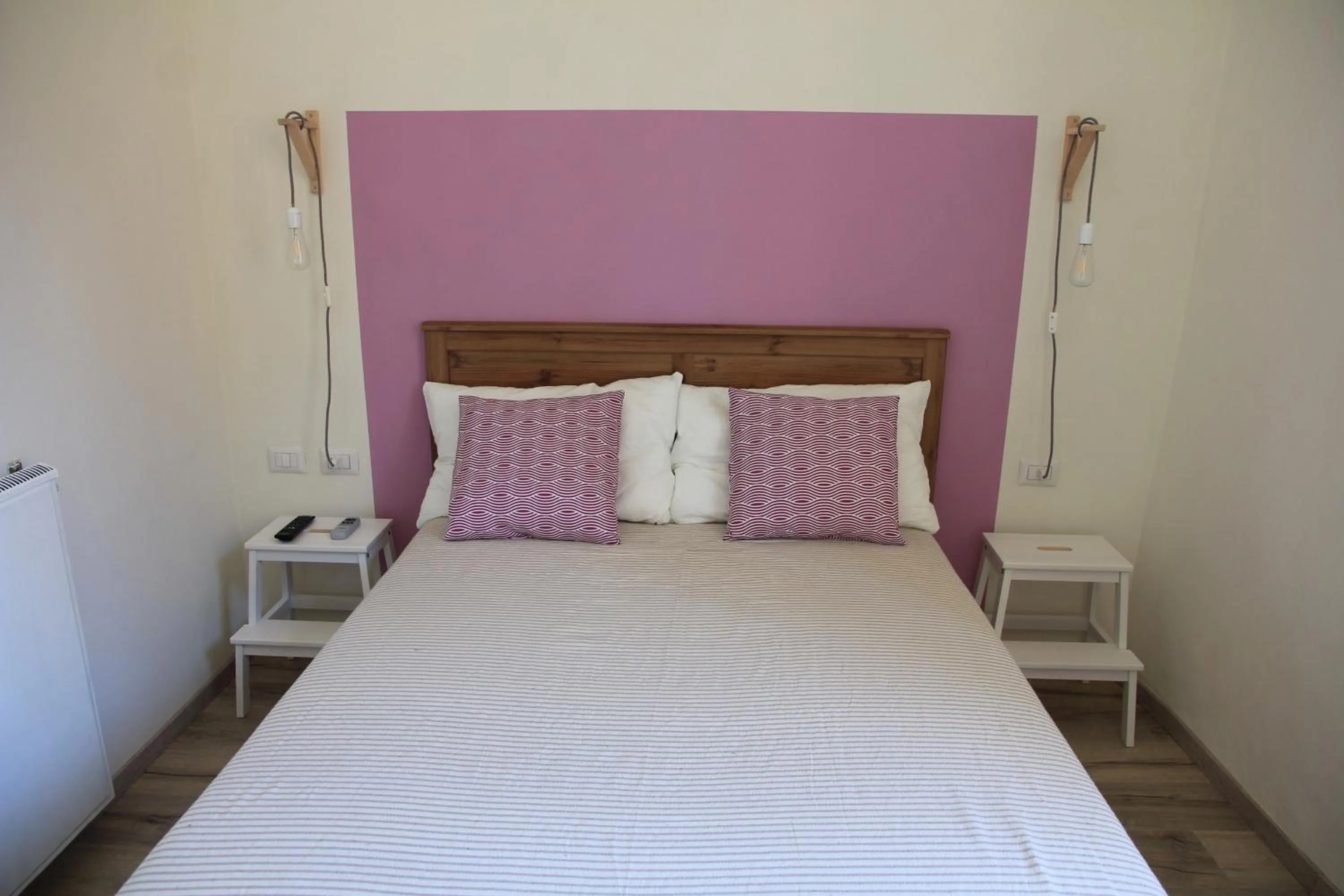 Bed in Hotel Elandra