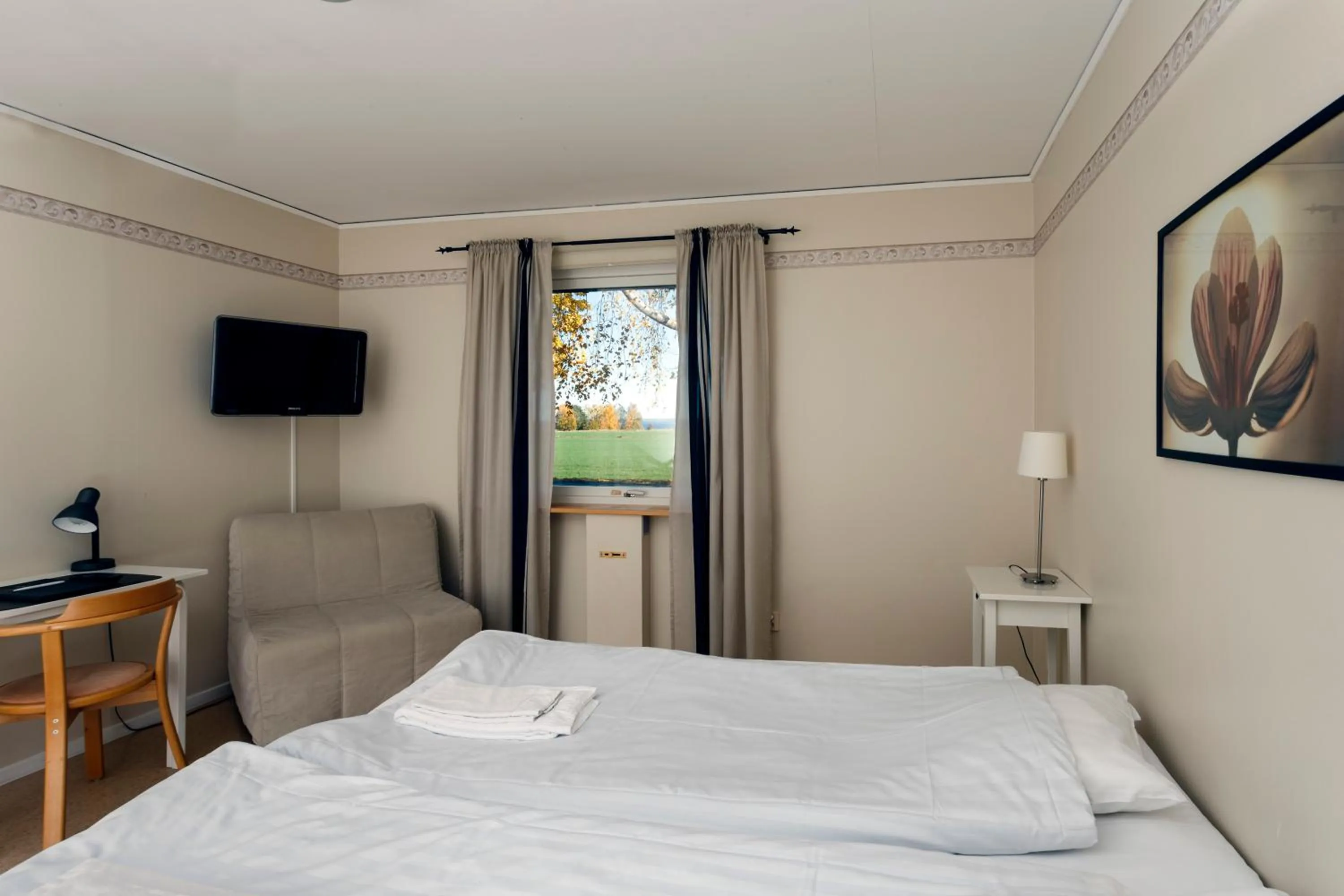 Bed in Wisingsö Hotell