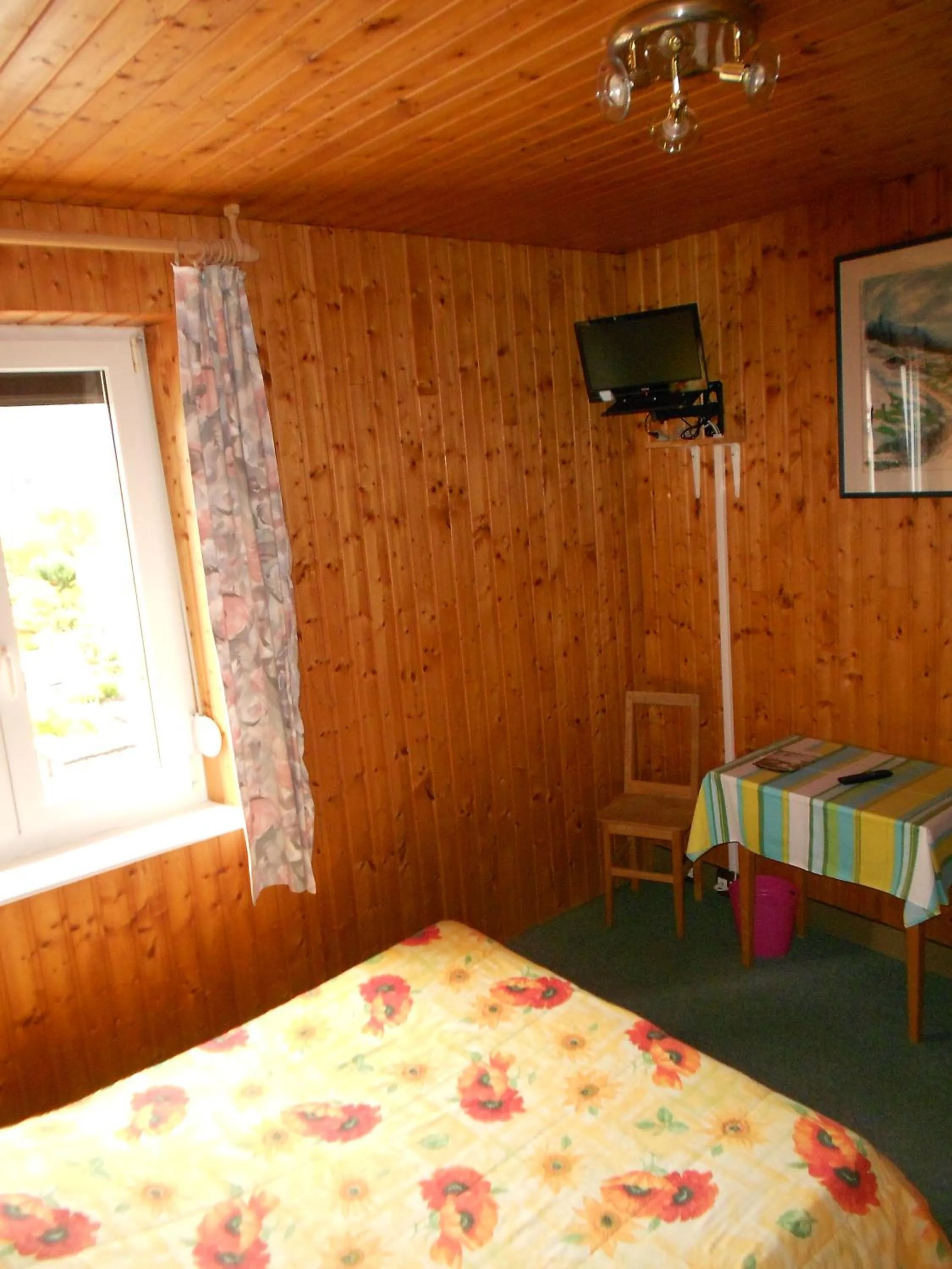 Bed in Hotel Les Sapins