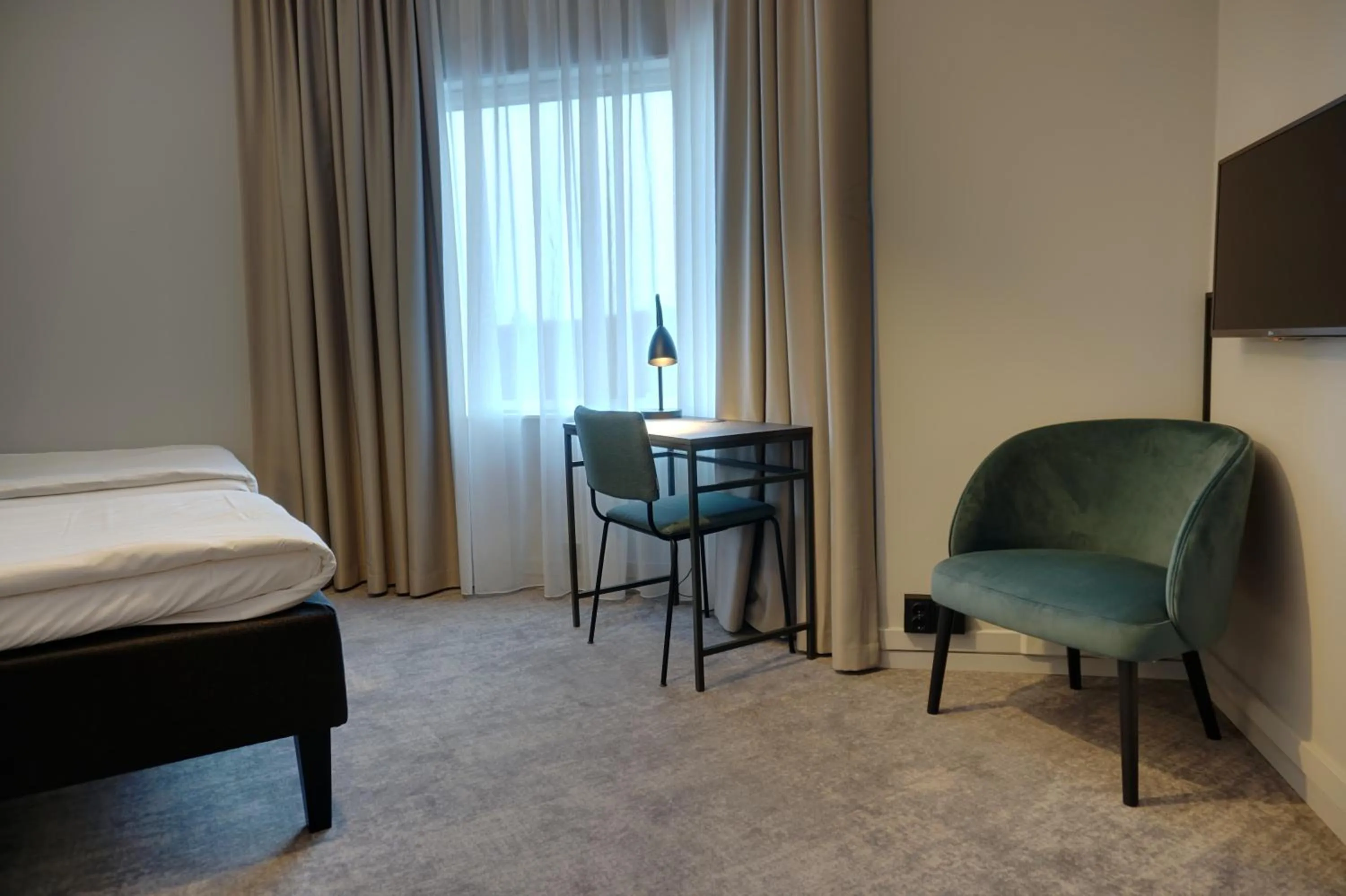 TV and multimedia, Bed in First Hotel Jönköping