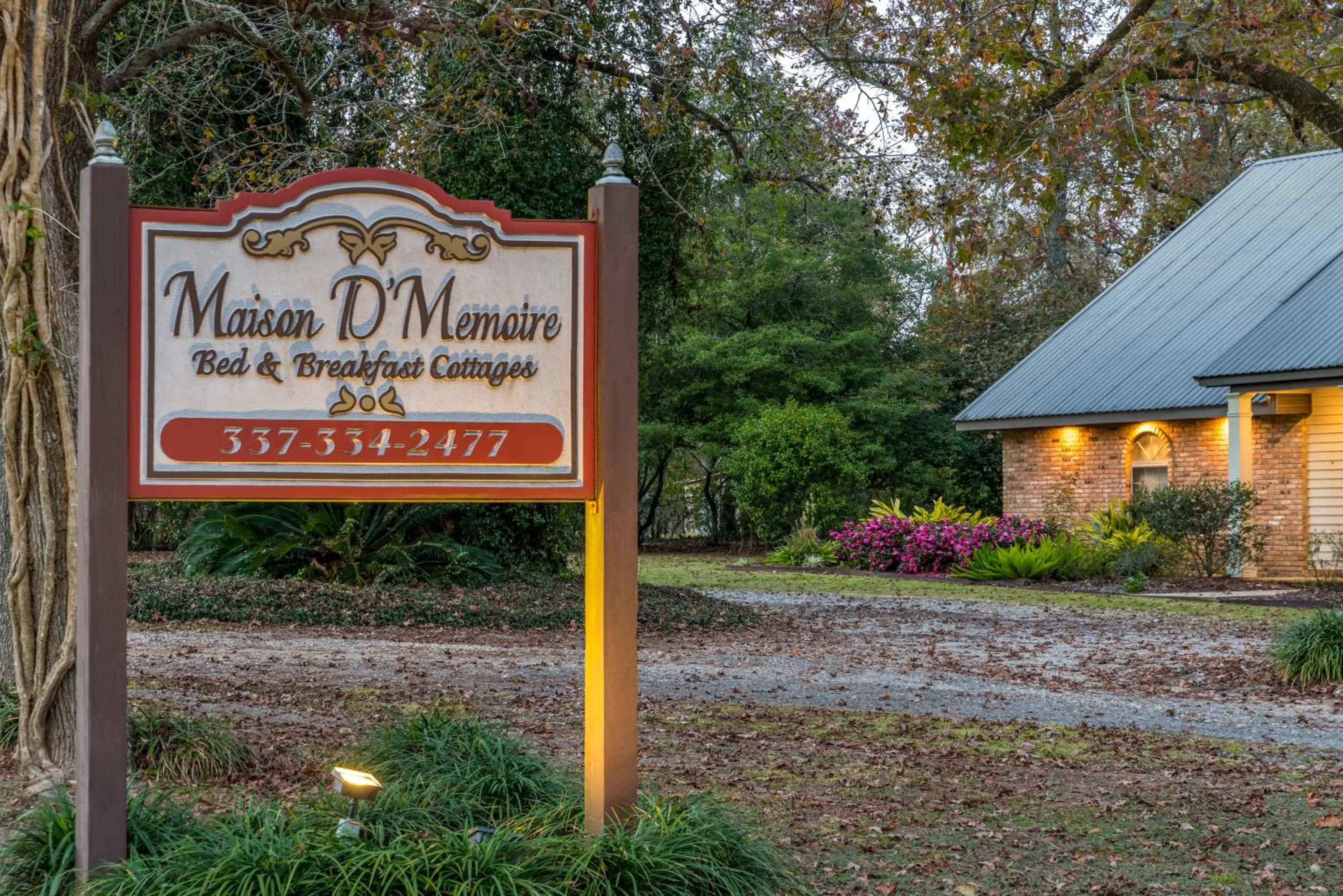 Property logo or sign in Maison D'Memoire Bed & Breakfast Cottages