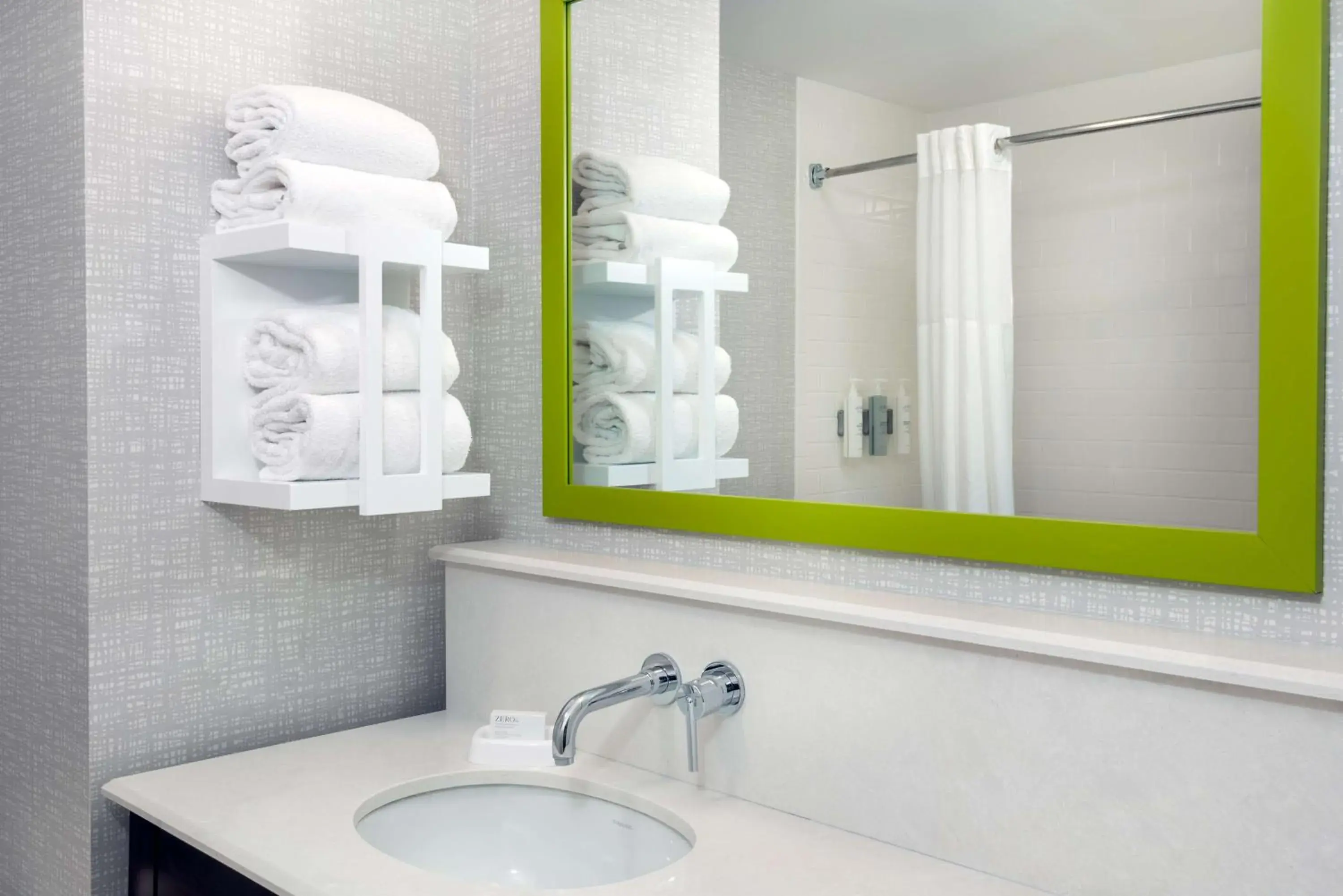 Bathroom in Hampton Inn Coventry-Warwick Area Bathroom in Hampton Inn Coventry-Warwick Area