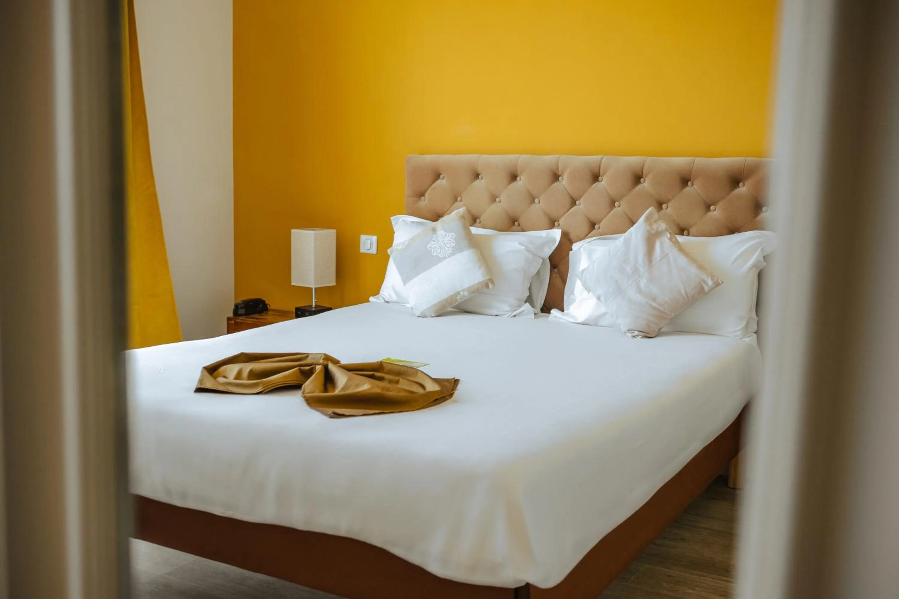 Bed in Hôtel du Bord de Mer "Le Vanillé"