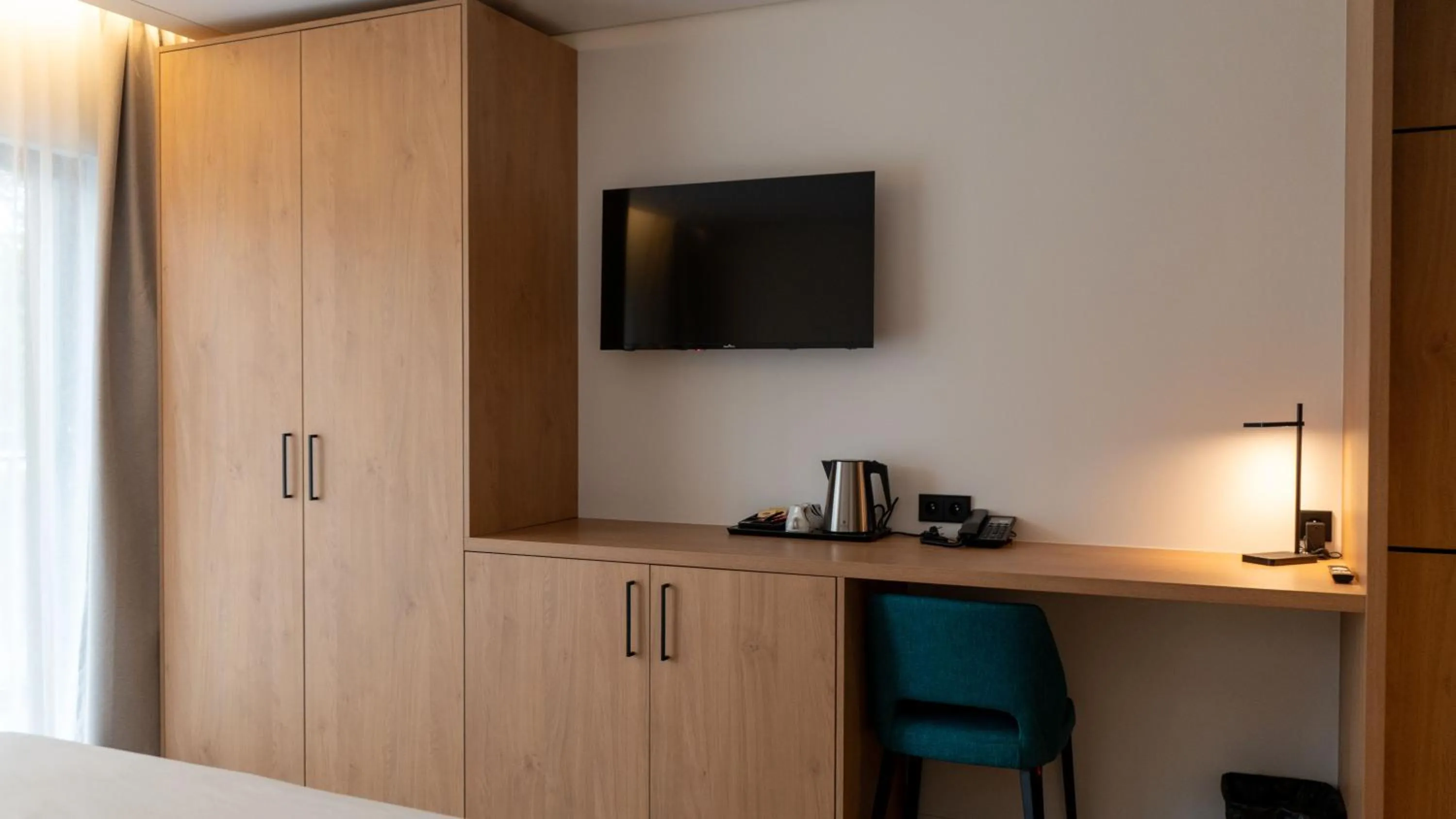 Bedroom in Brit Hotel Grand Hotel Munster