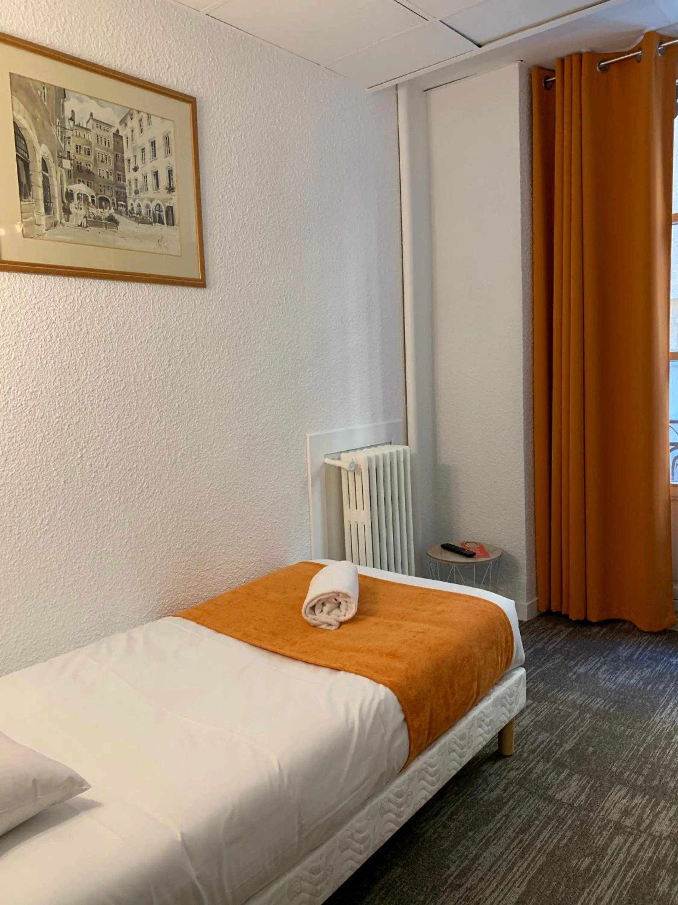 Bed in Hotel de Bretagne