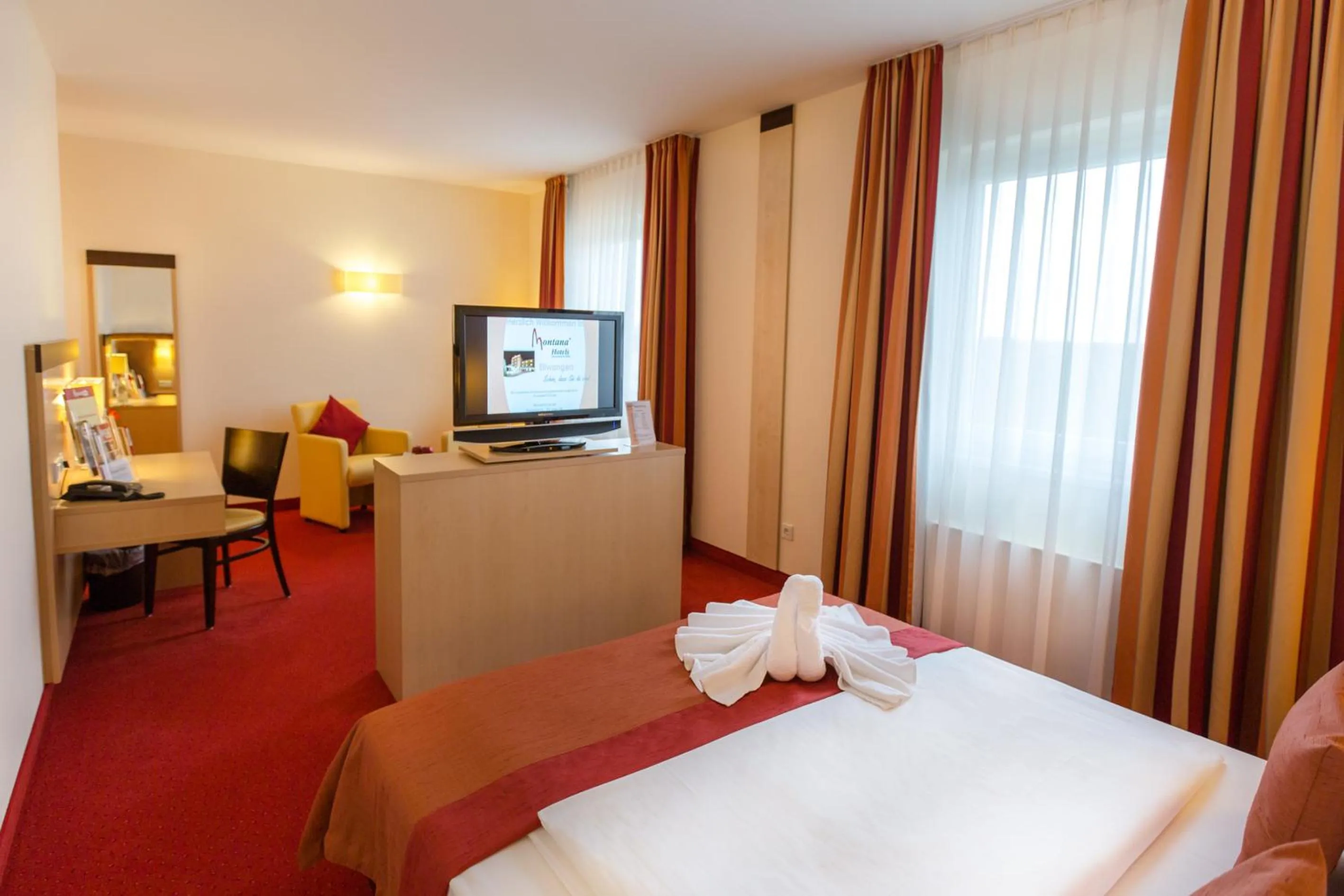 Photo of the whole room, Bed in Montana-Hotel Ellwangen