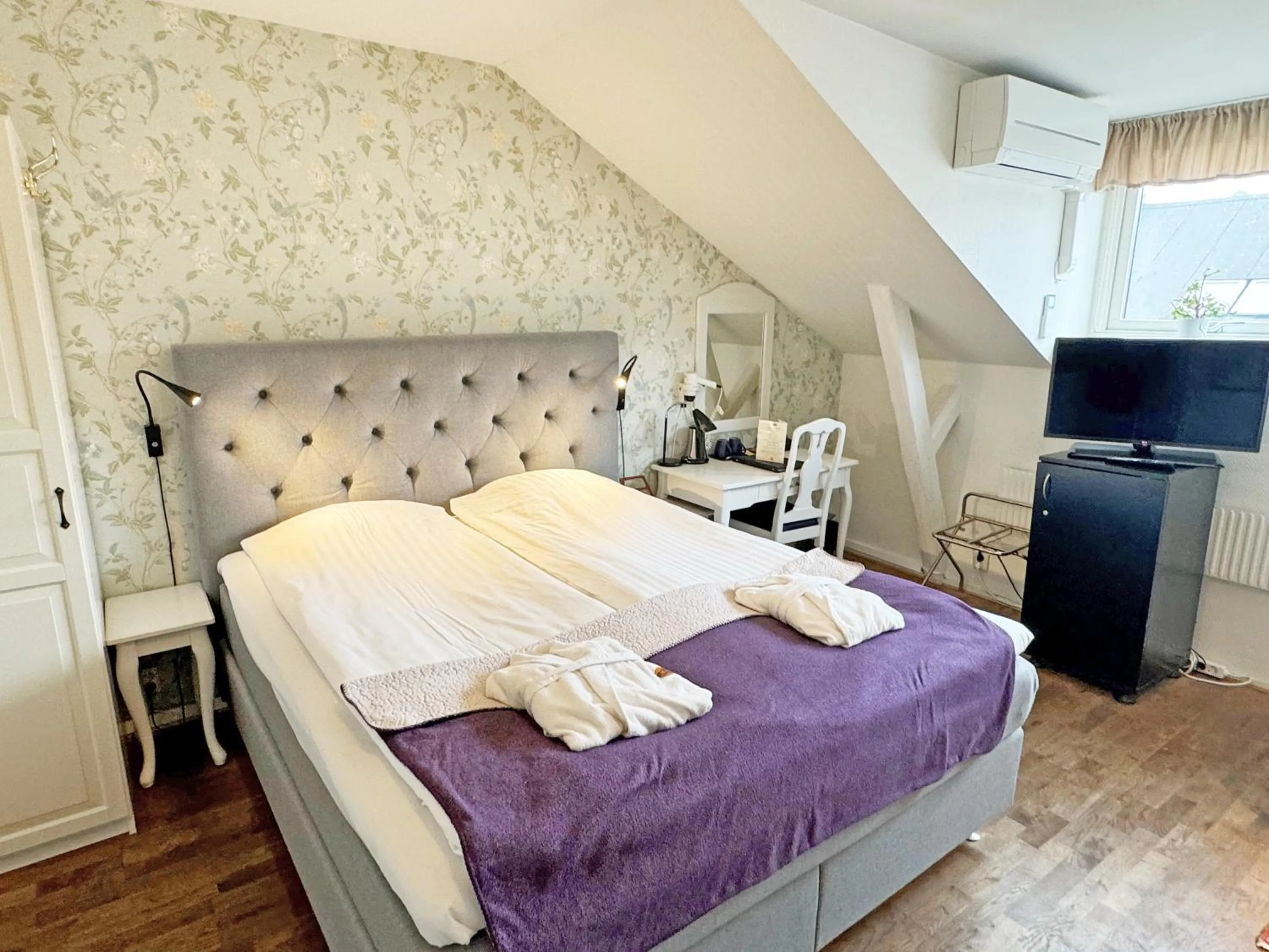 Bed in Hotel Concordia