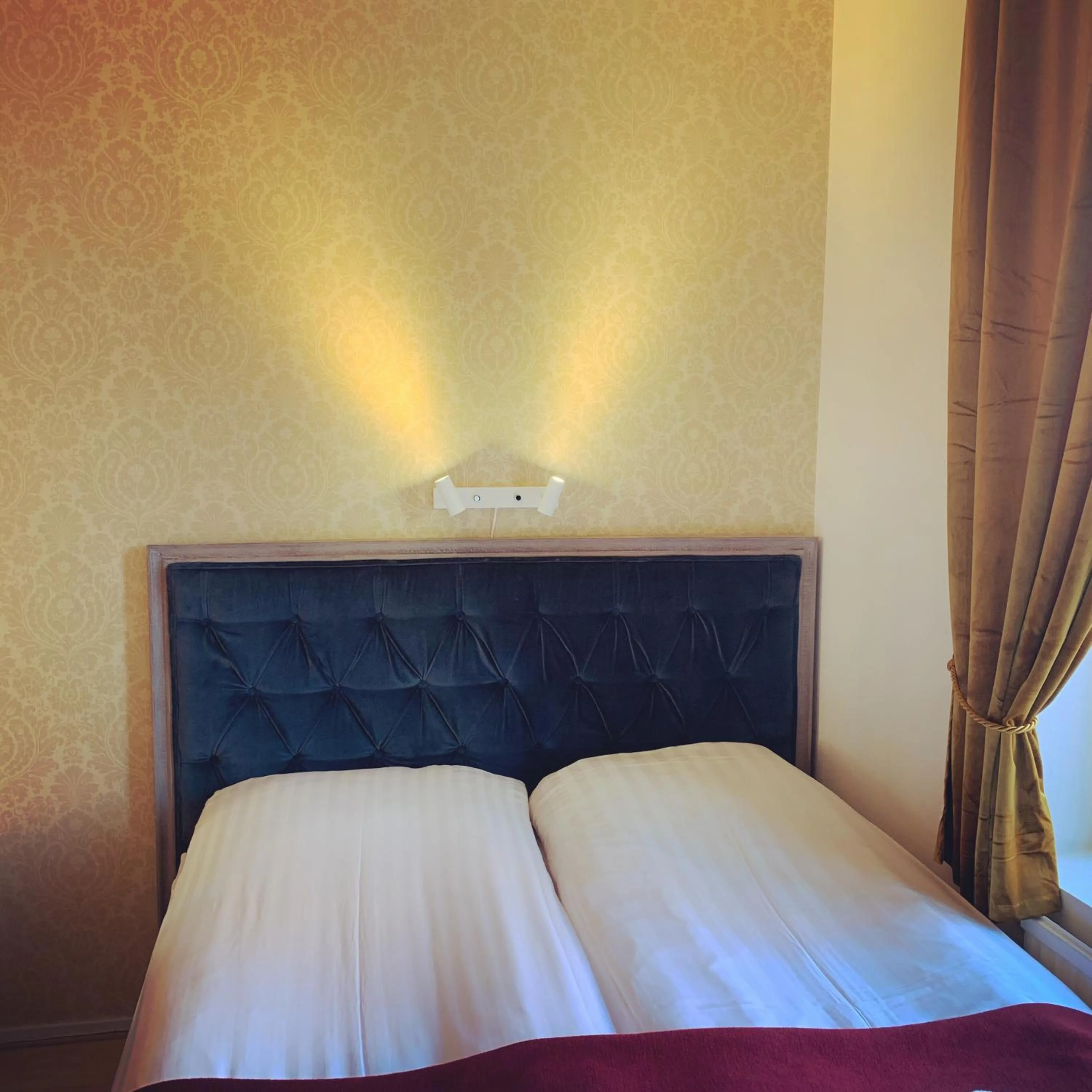 Bed in Hotel Concordia