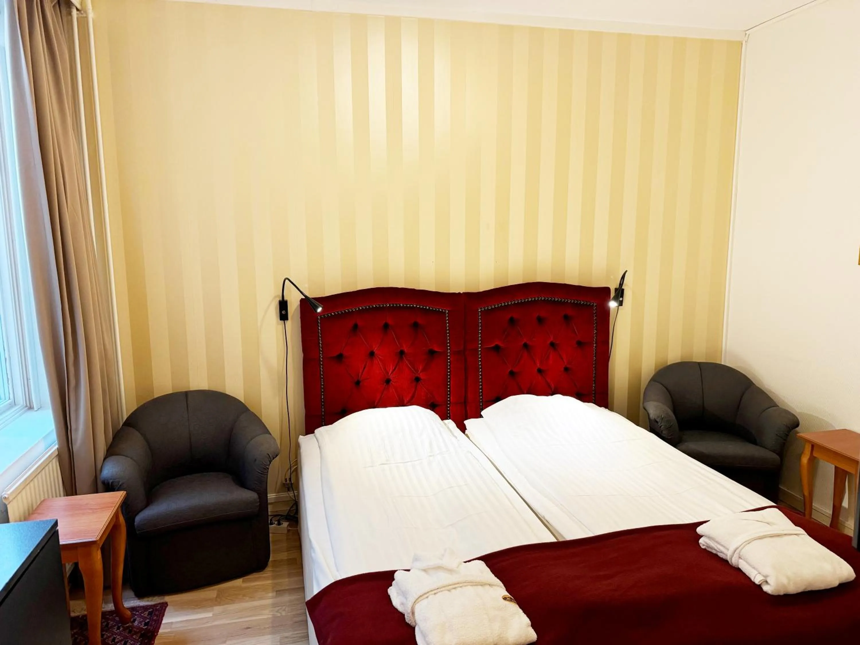 Bed in Hotel Concordia