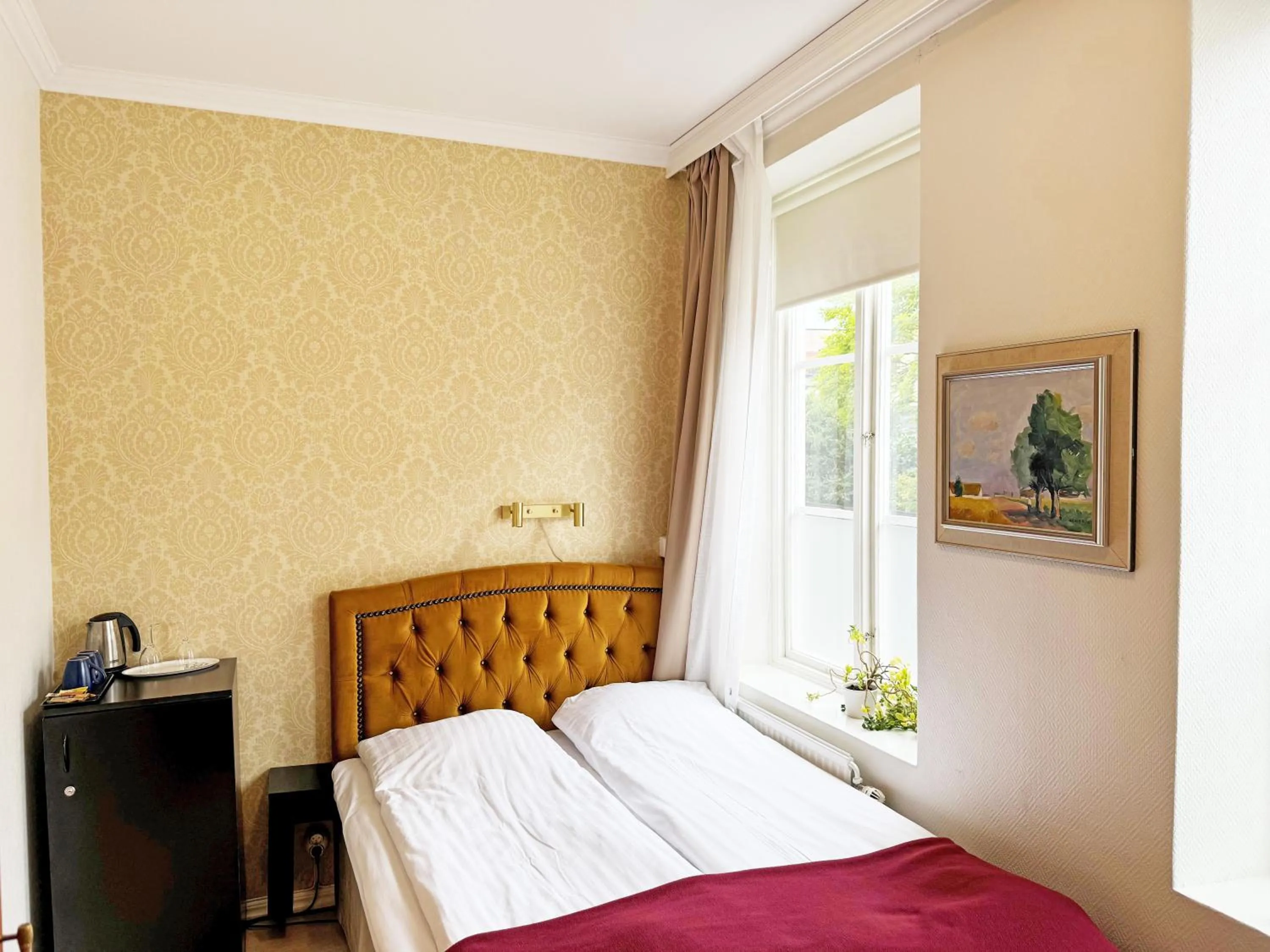 Bed in Hotel Concordia