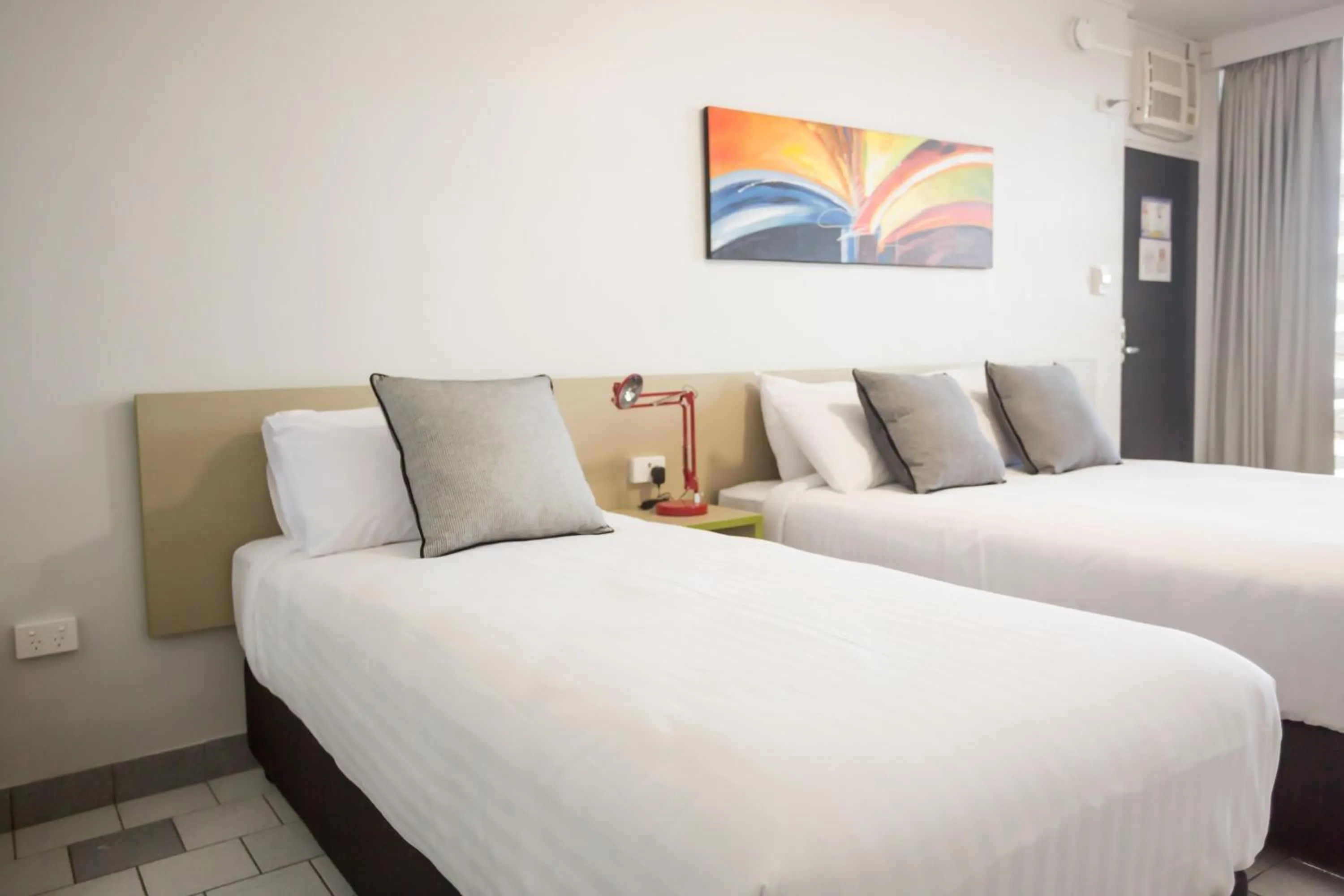 Bedroom, Bed in Nightcap at Emerald Star Hotel