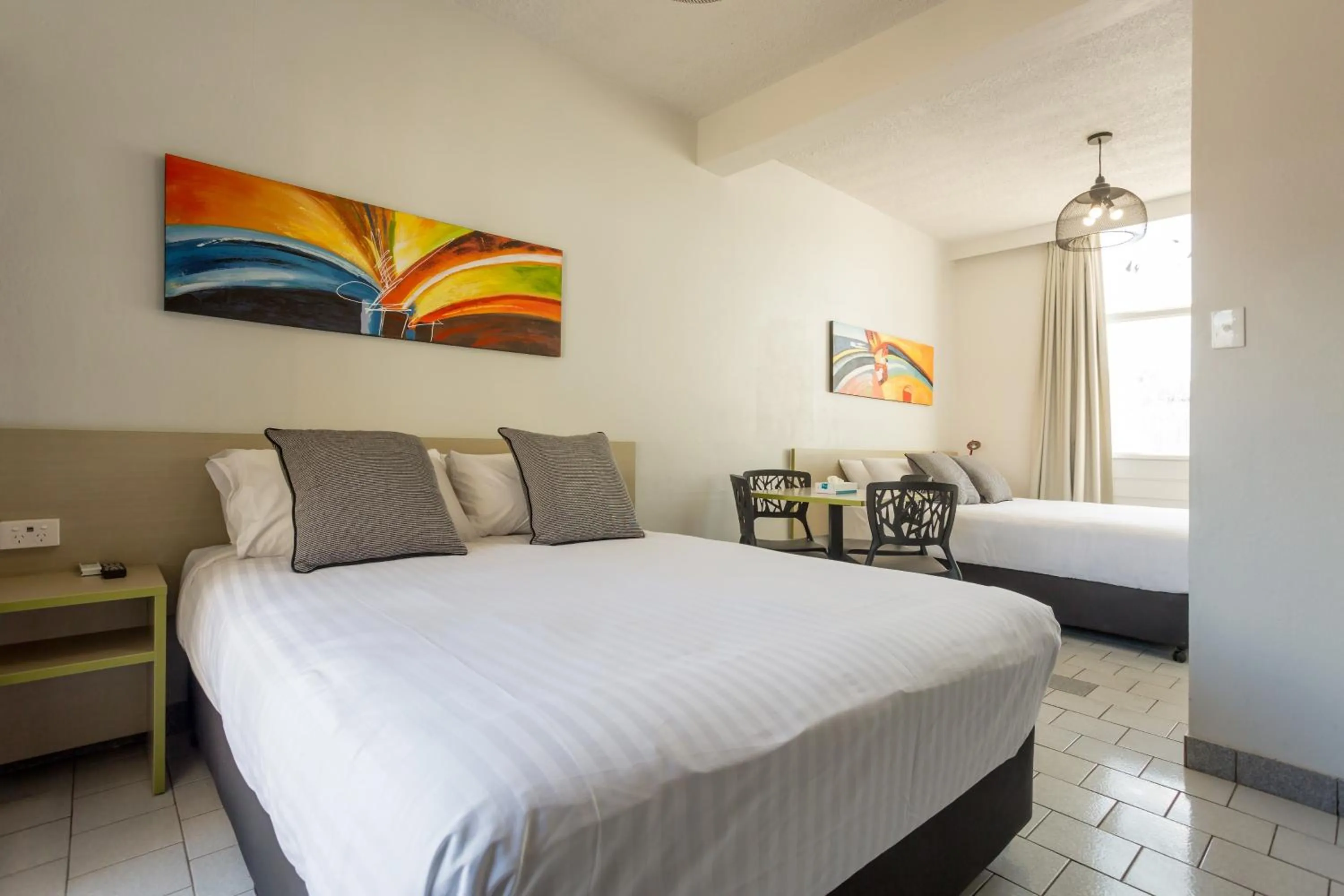 Photo of the whole room, Bed in Nightcap at Emerald Star Hotel