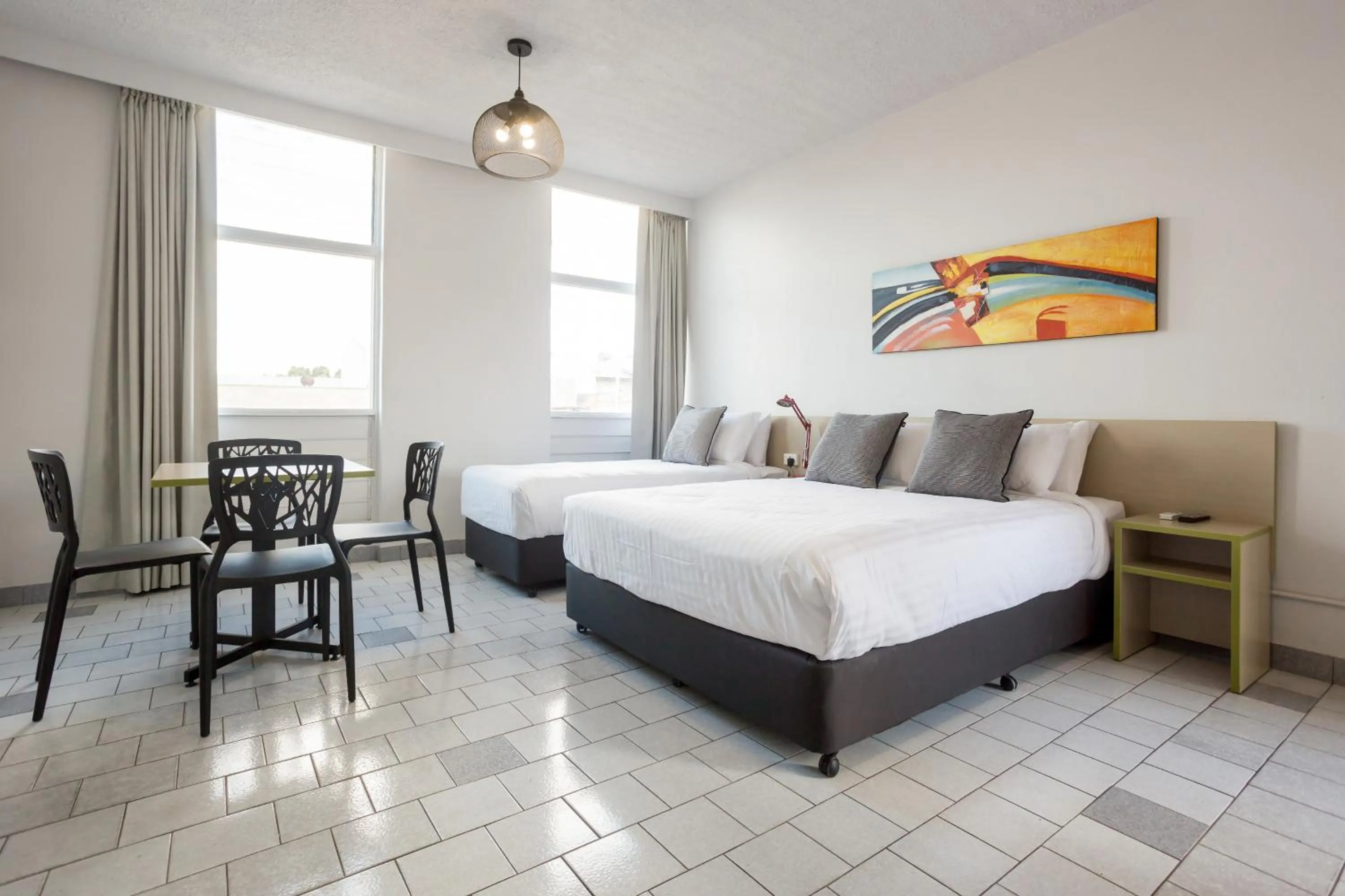 Photo of the whole room, Bed in Nightcap at Emerald Star Hotel