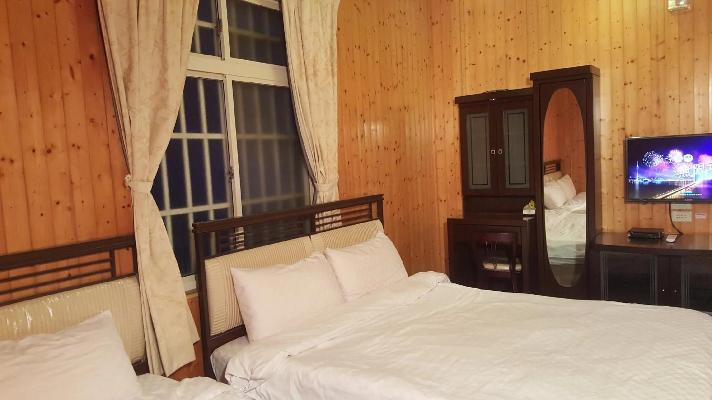 Bed in Ming Yang B&B