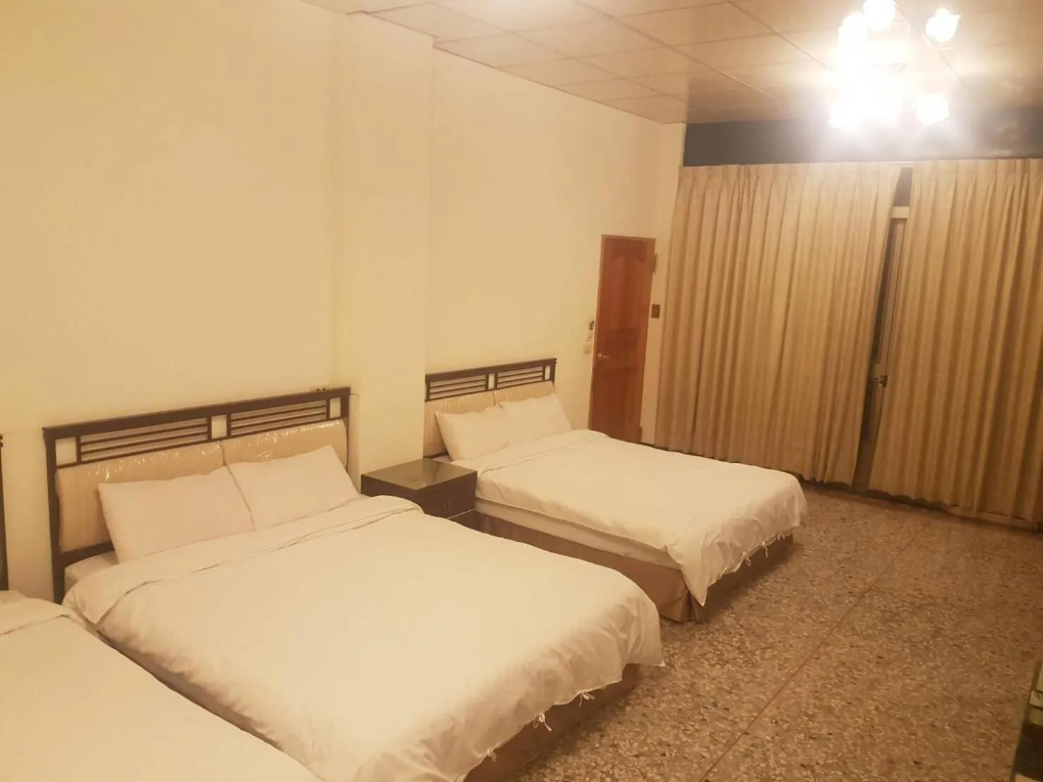 Bed in Ming Yang B&B