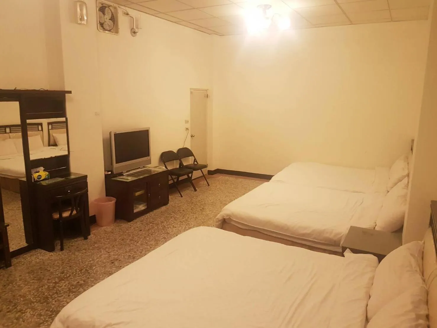 Bed in Ming Yang B&B