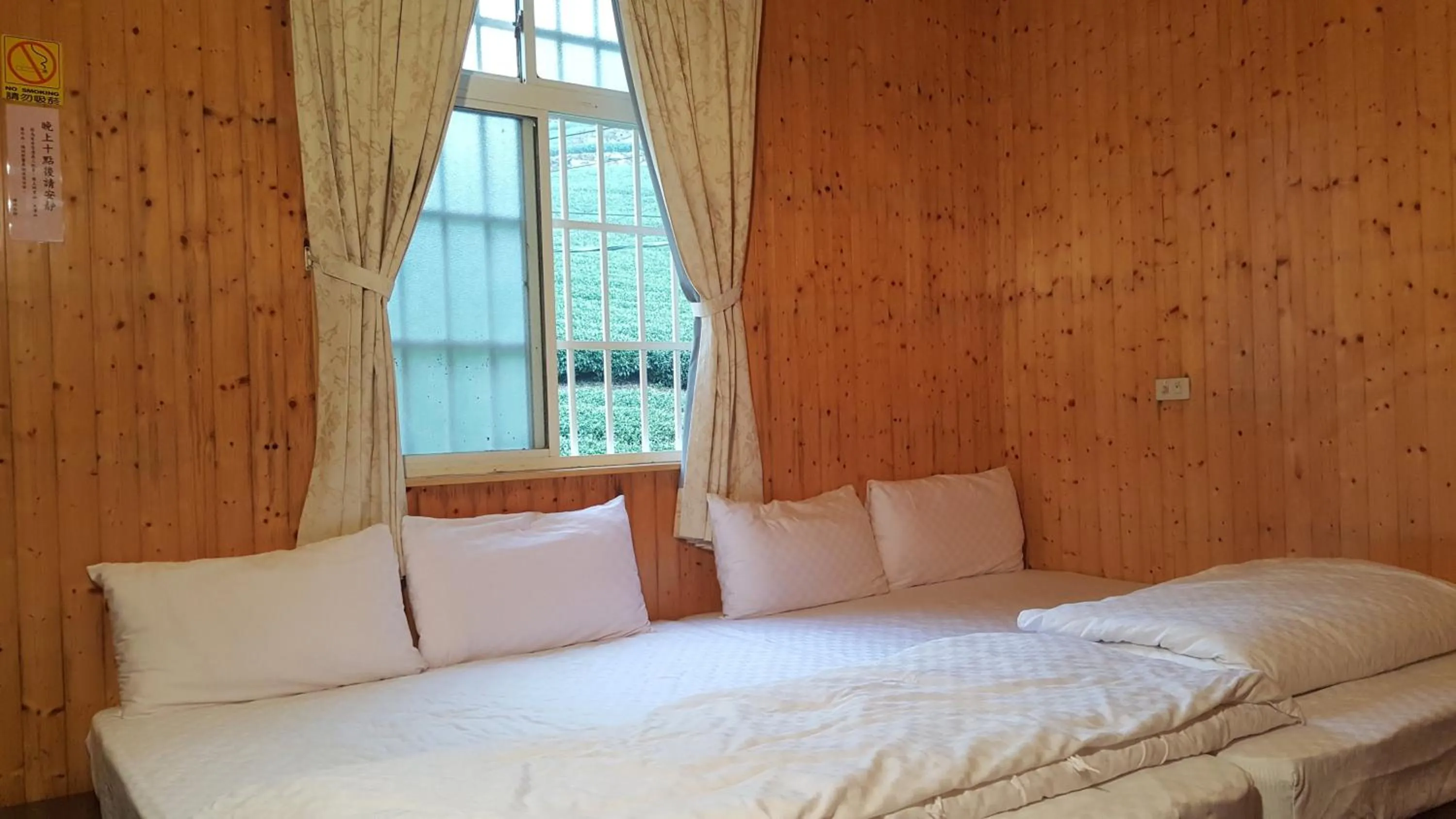 Bed in Ming Yang B&B