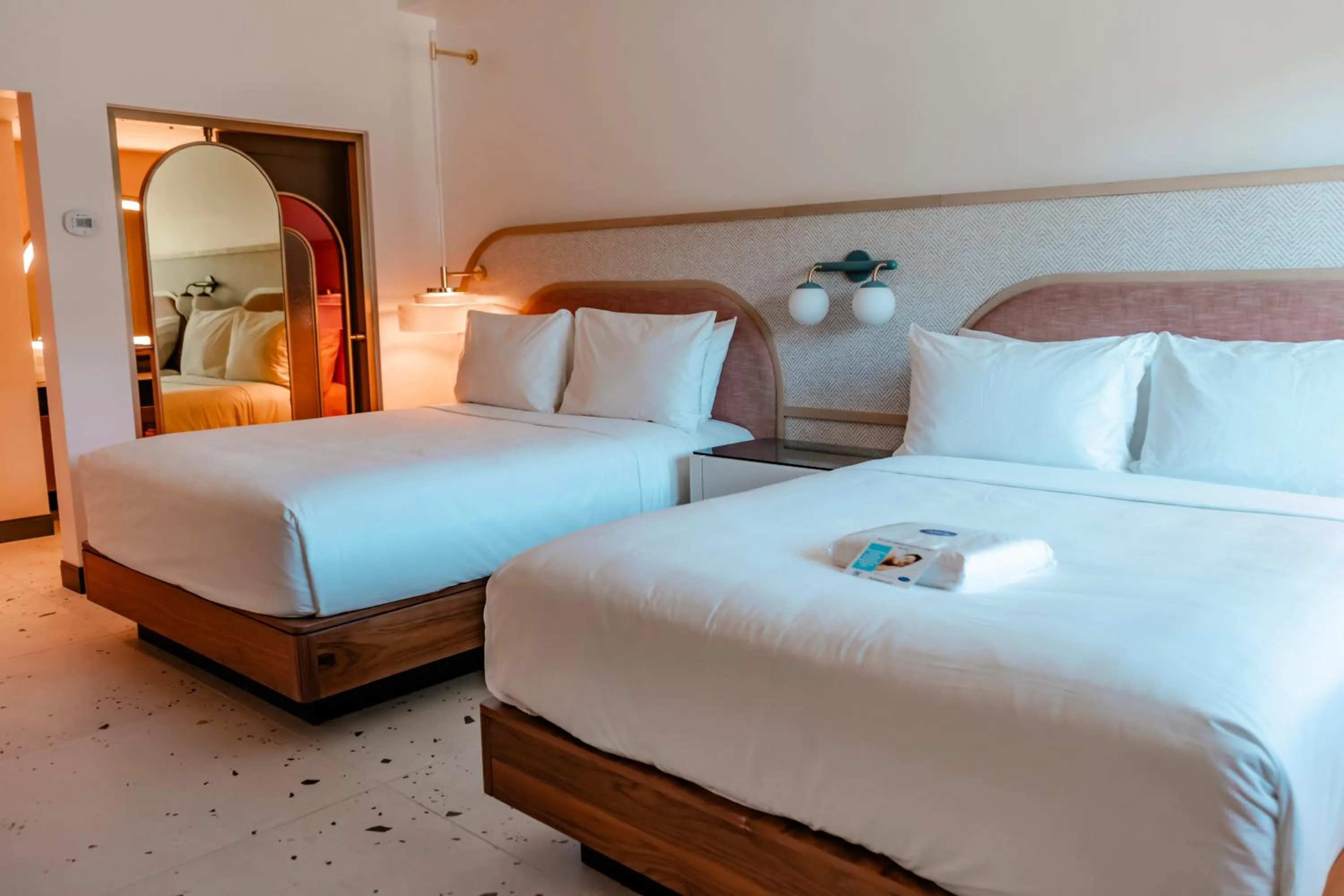 Bed in Postcard Inn On The Beach