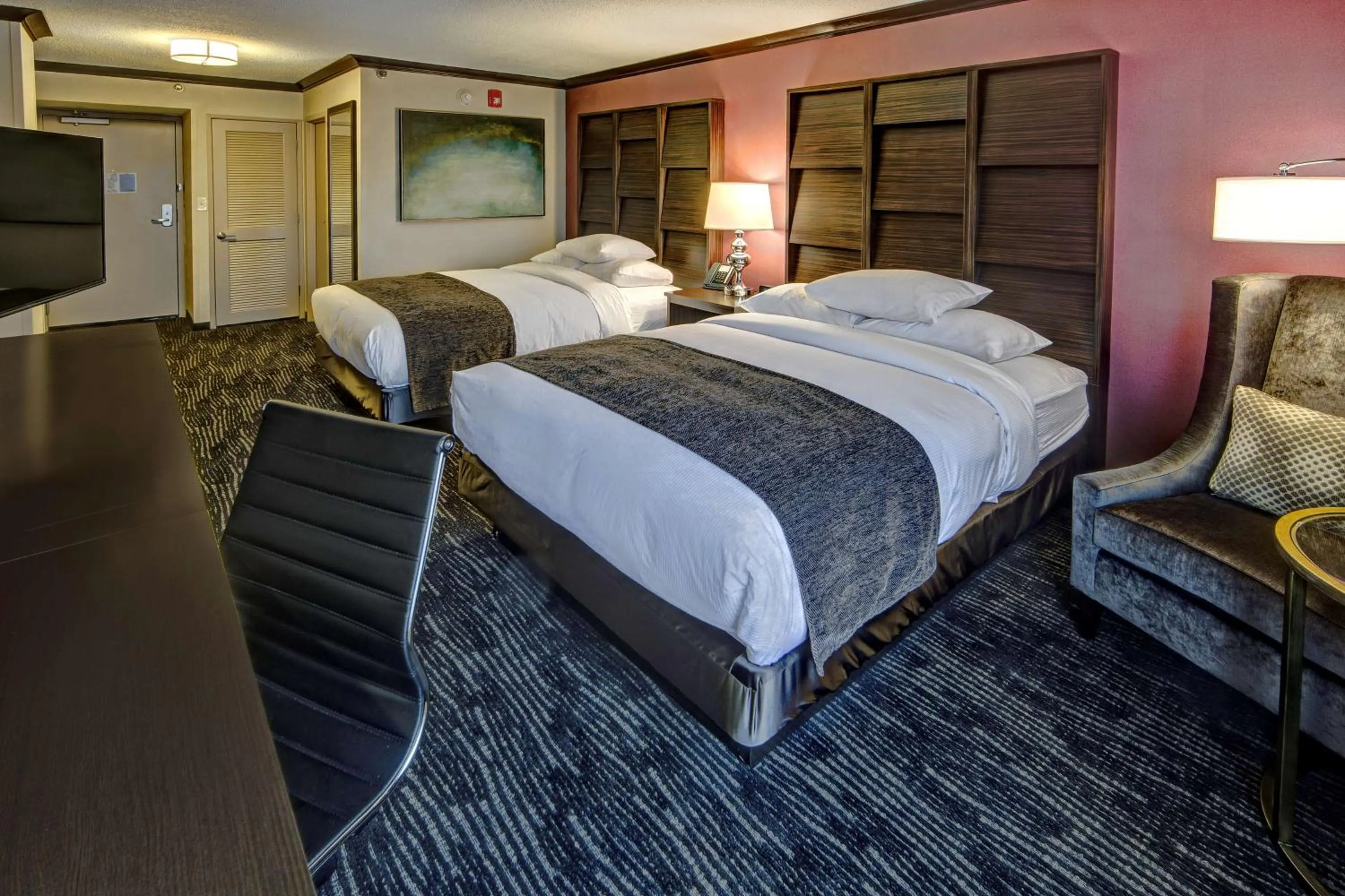 Bed in DoubleTree by Hilton Decatur Riverfront