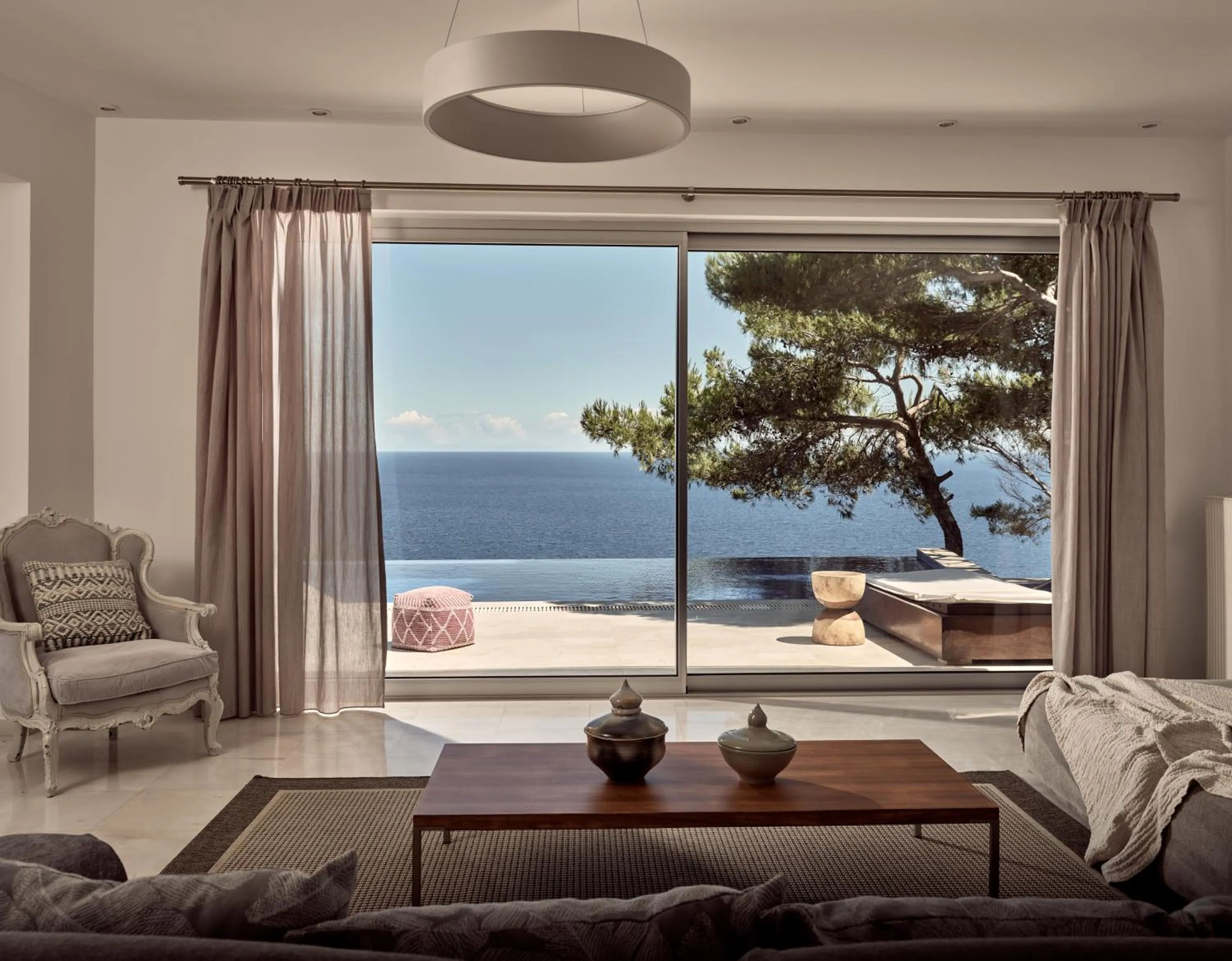 Living room in Iconic Ionian Mudita Villa, By ThinkVilla