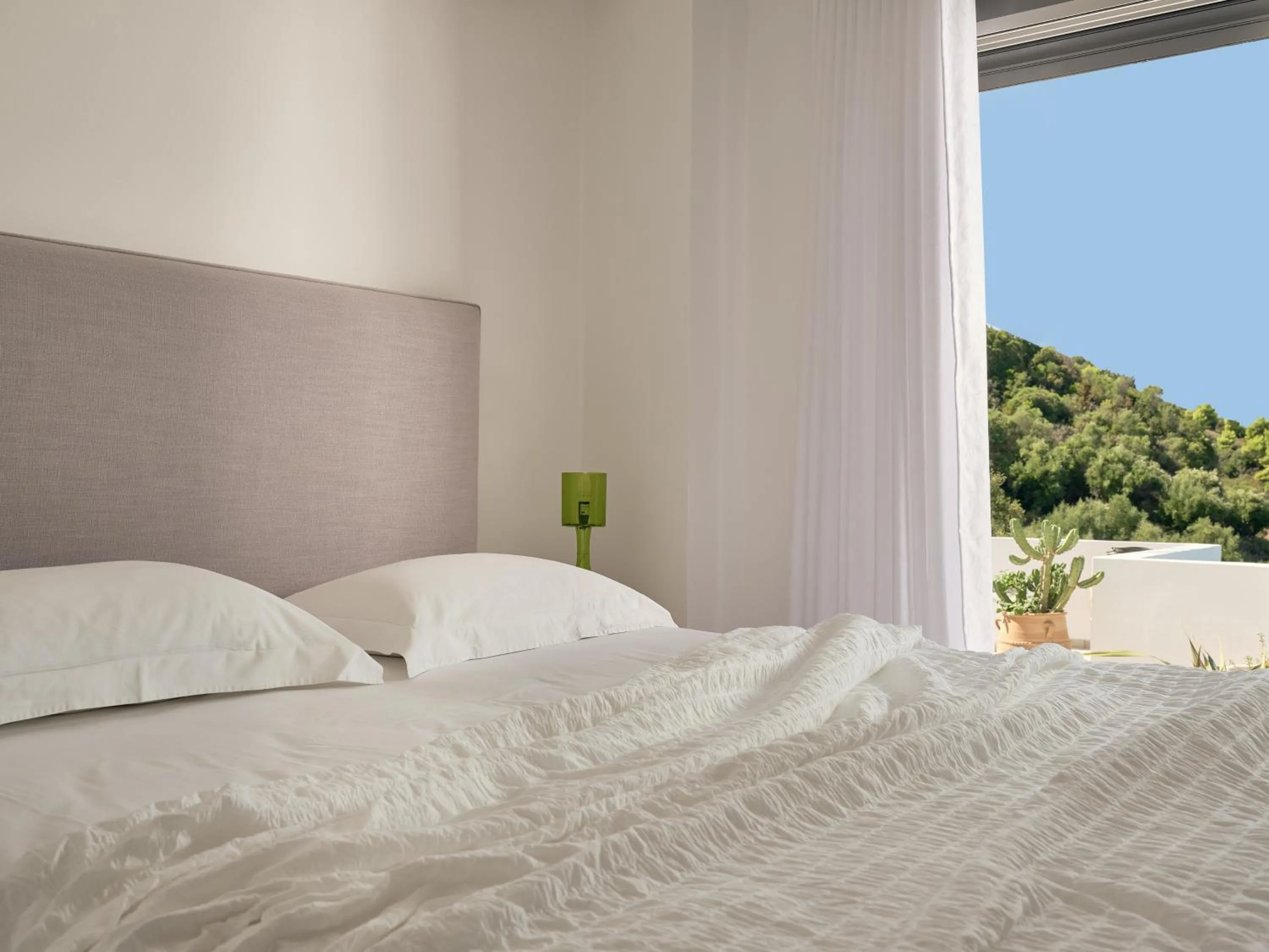 Bed in Iconic Ionian Mudita Villa, By ThinkVilla