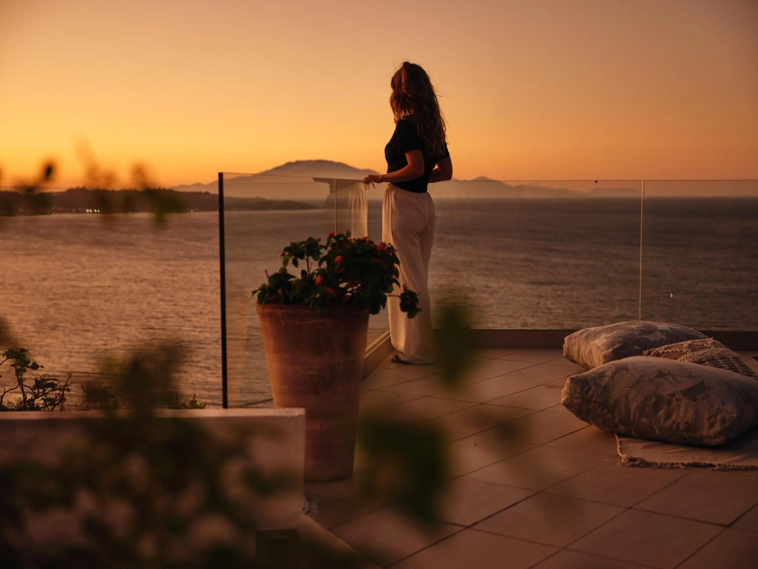 People in Iconic Ionian Mudita Villa, By ThinkVilla