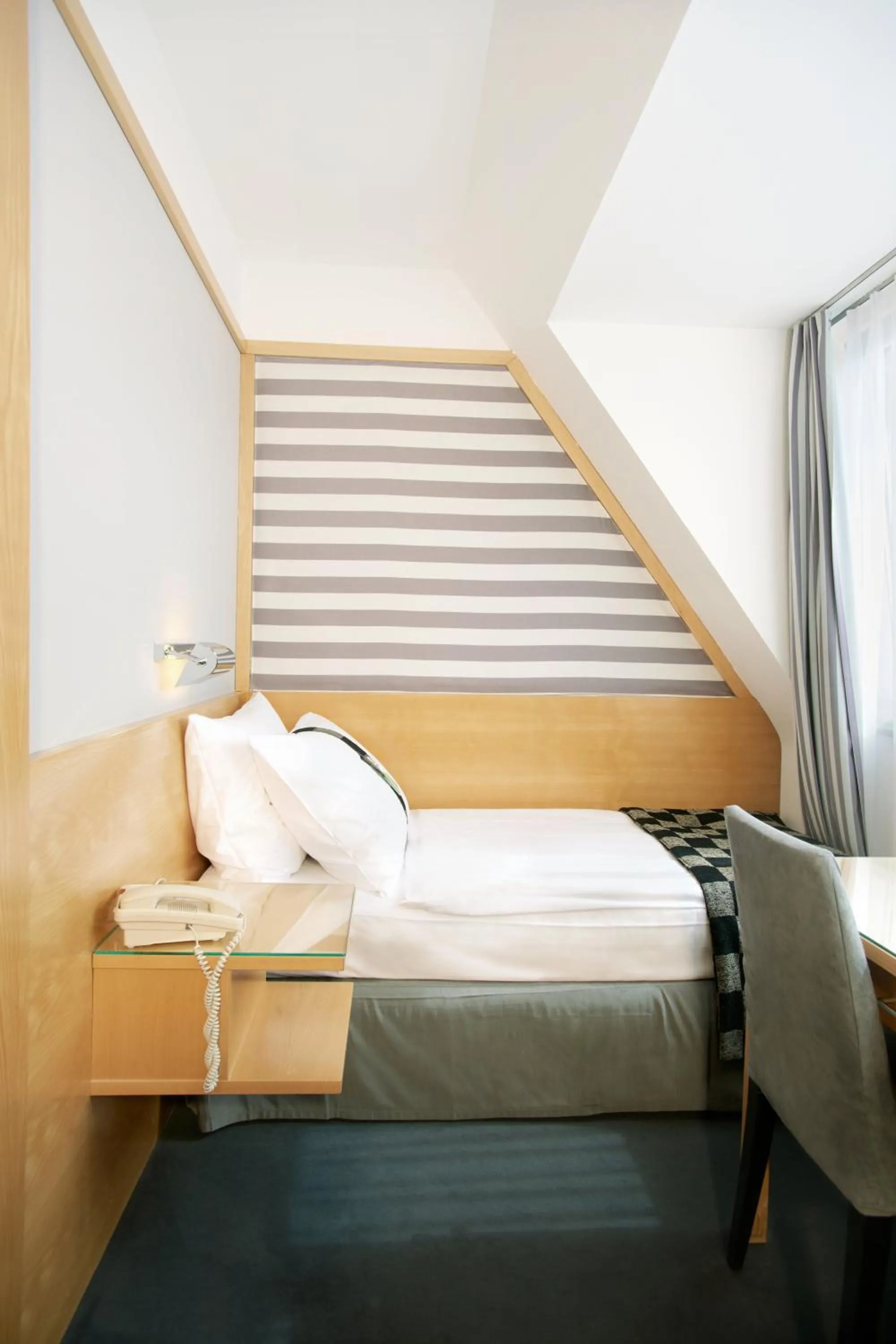 Photo of the whole room, Bed in Holiday Inn Vienna City by IHG