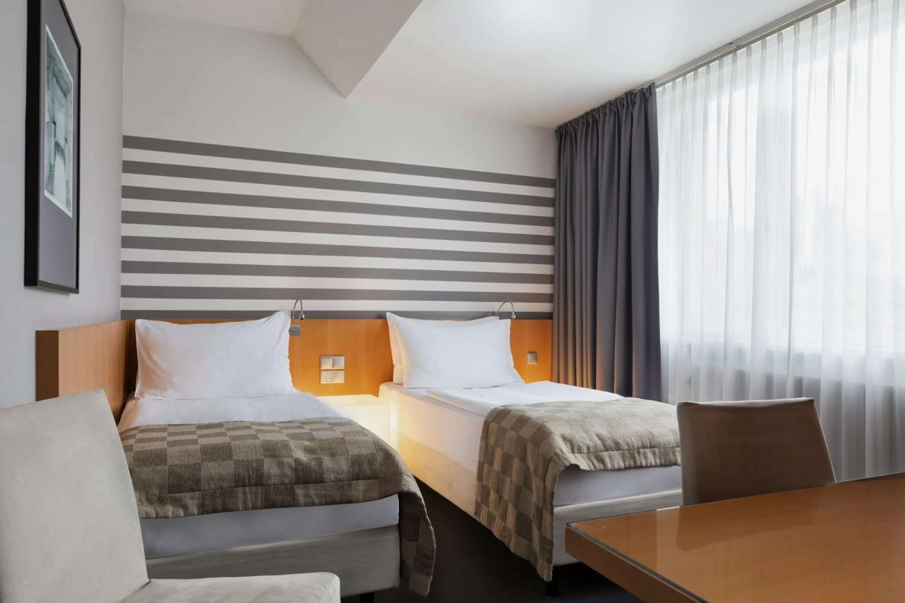 Photo of the whole room, Bed in Holiday Inn Vienna City by IHG