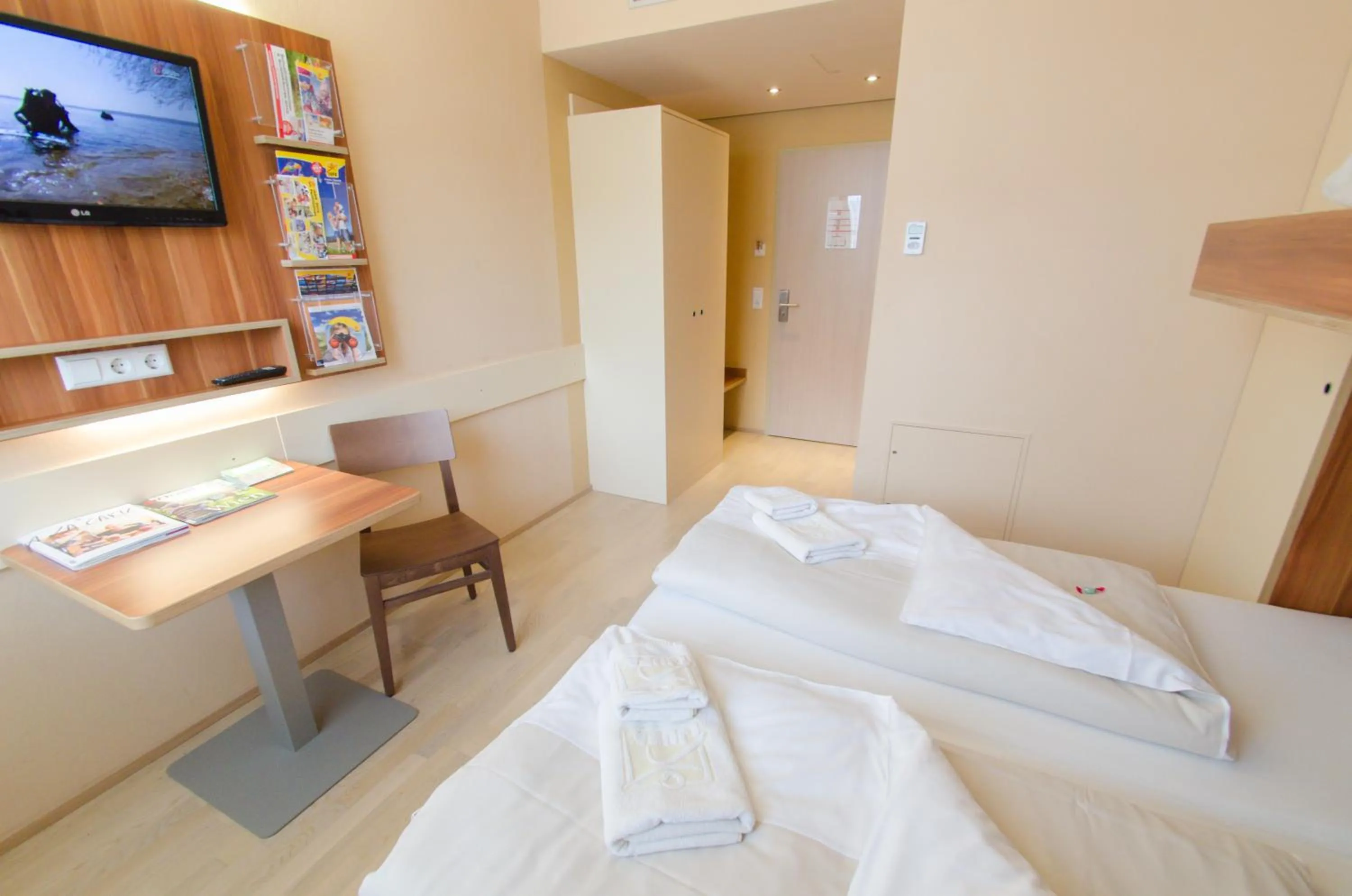 Photo of the whole room, Bed in JUFA Hotel Graz City