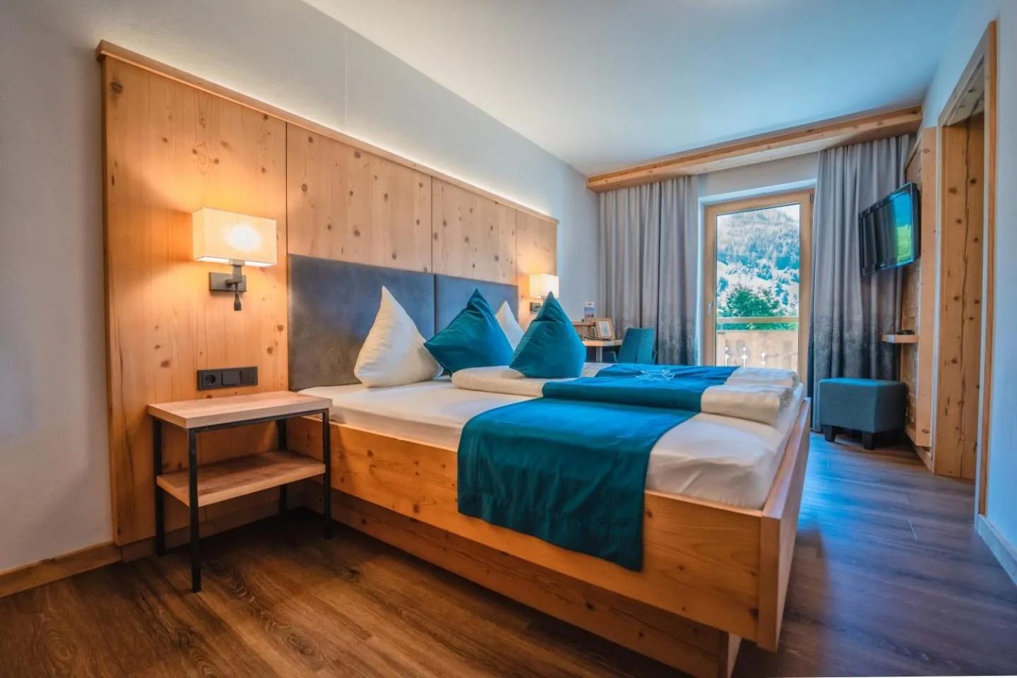 Bed in Smaragdhotel Tauernblick