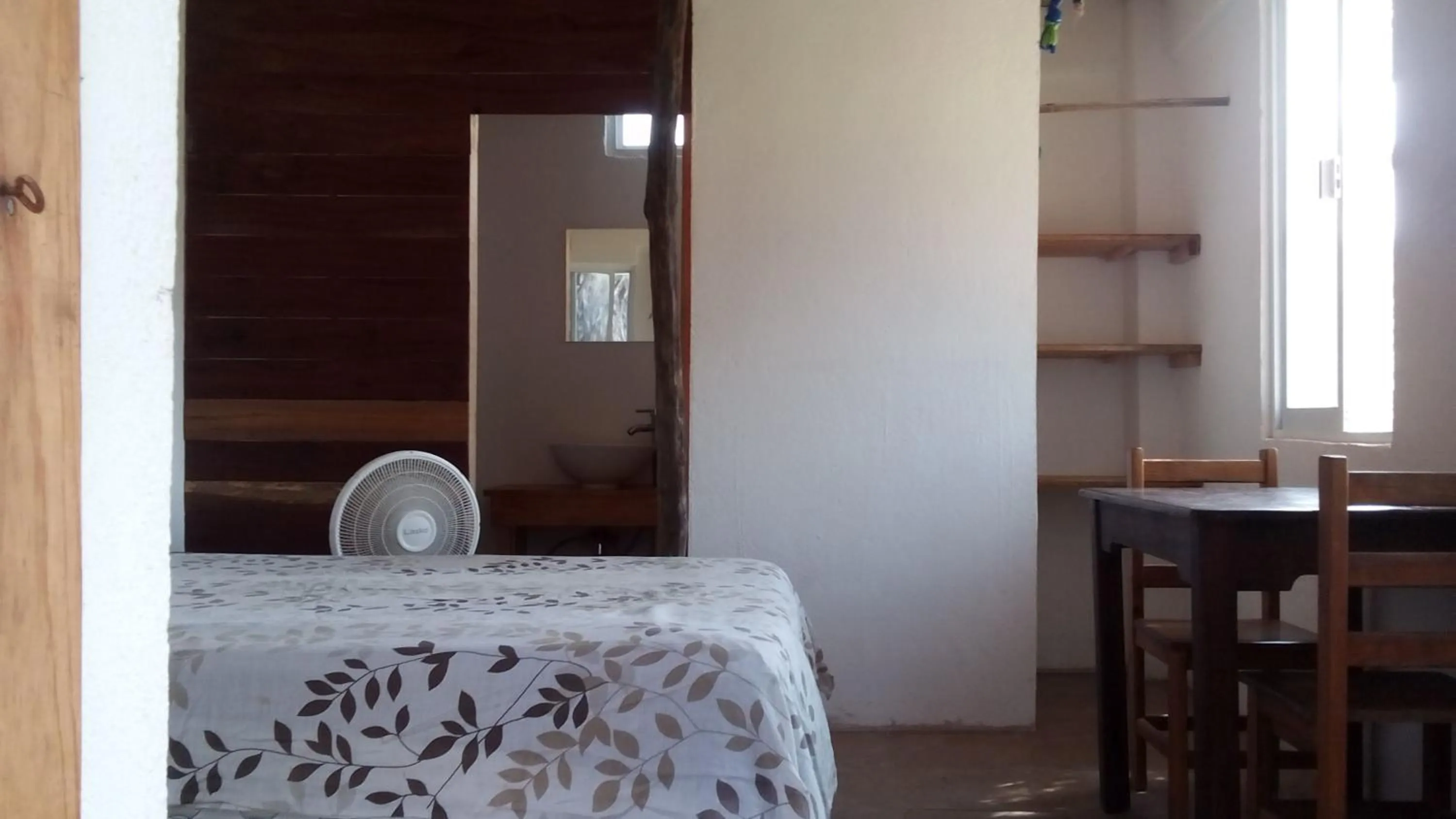 Photo of the whole room, Bed in Cafe Maya - Casa Acalli