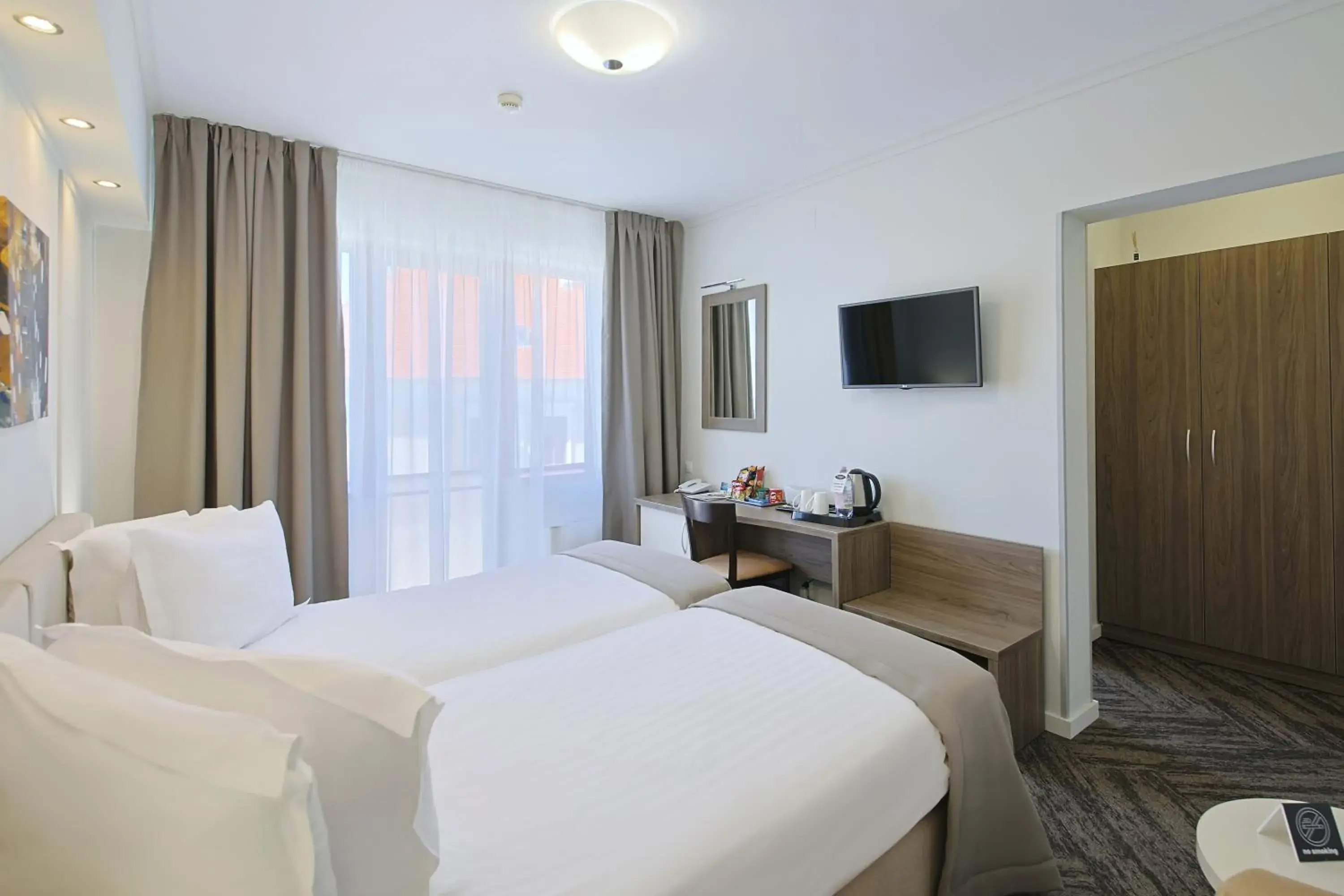 Standard Twin Room - single occupancy in Potaissa Hotel Standard Twin Room - single occupancy in Potaissa Hotel