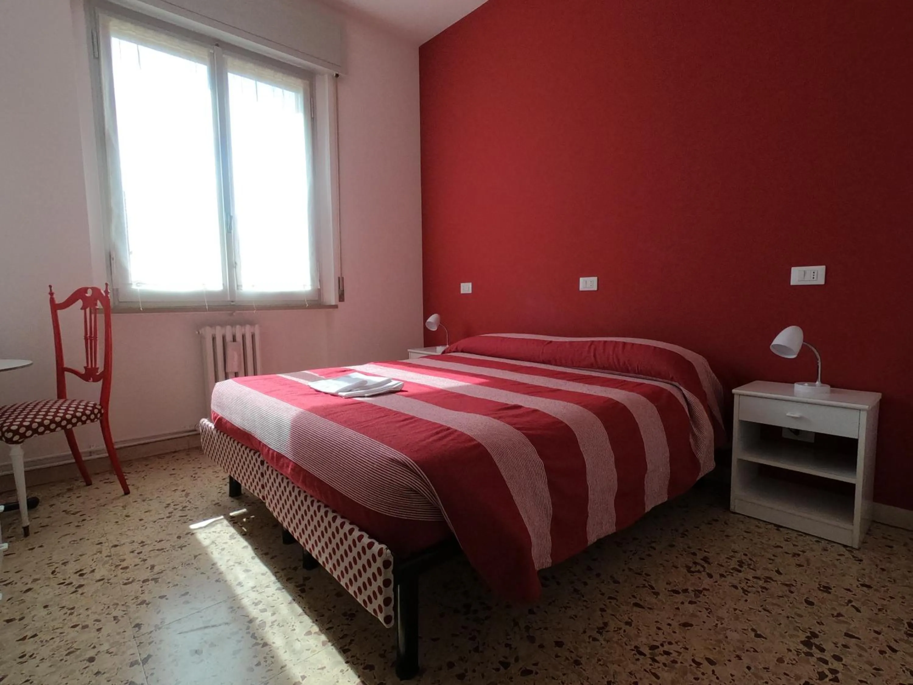 Bed in Gardenia Guest House