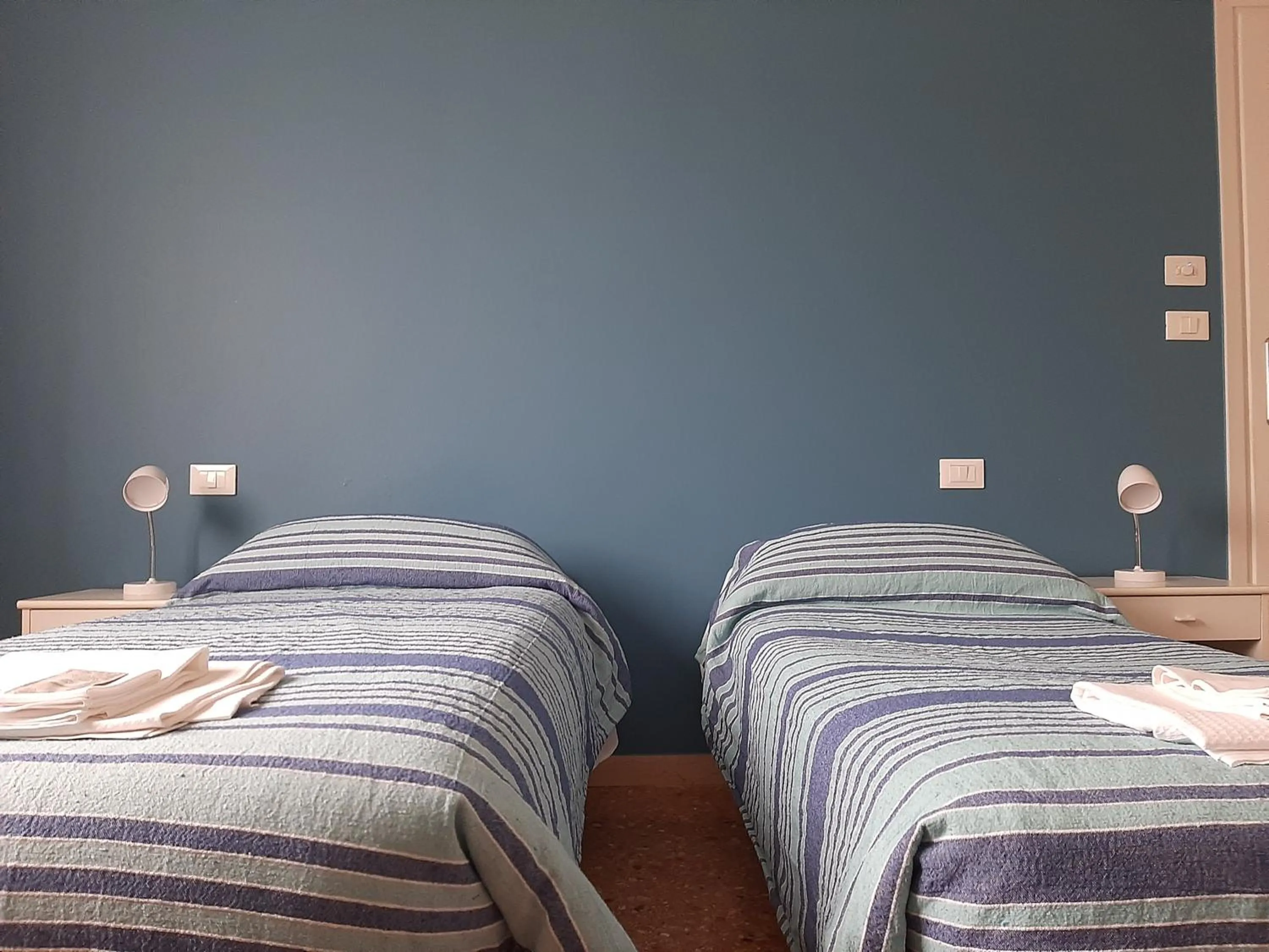 Bed in Gardenia Guest House